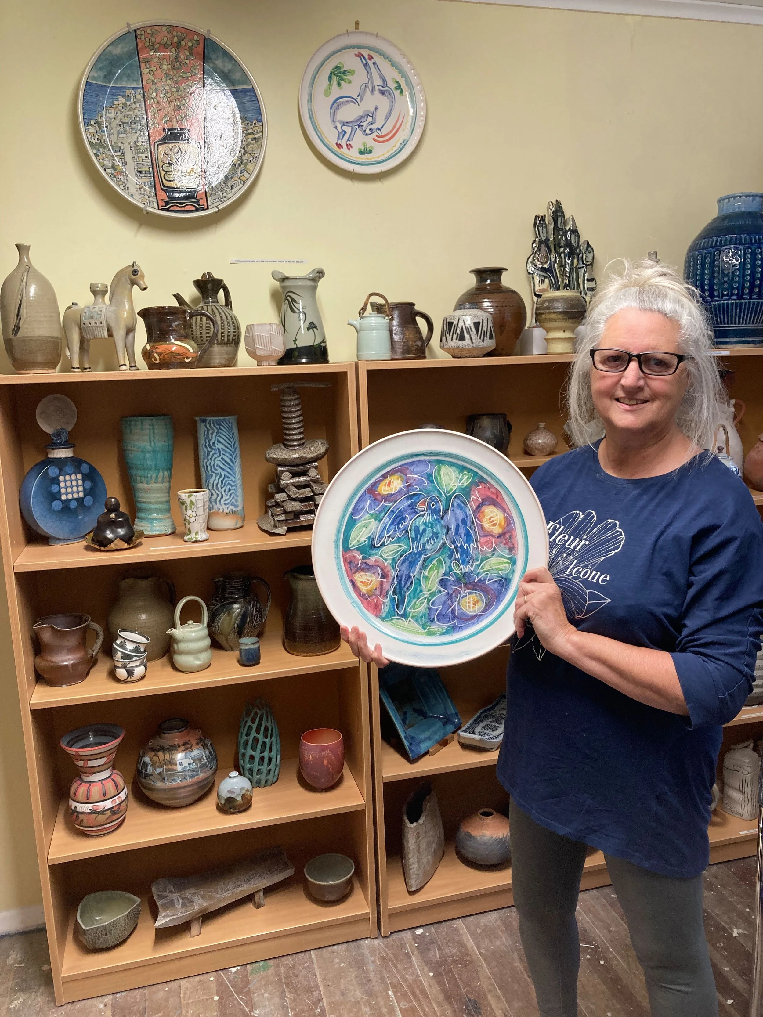 Coral Dolan holds a plate by Mattias Oostermann