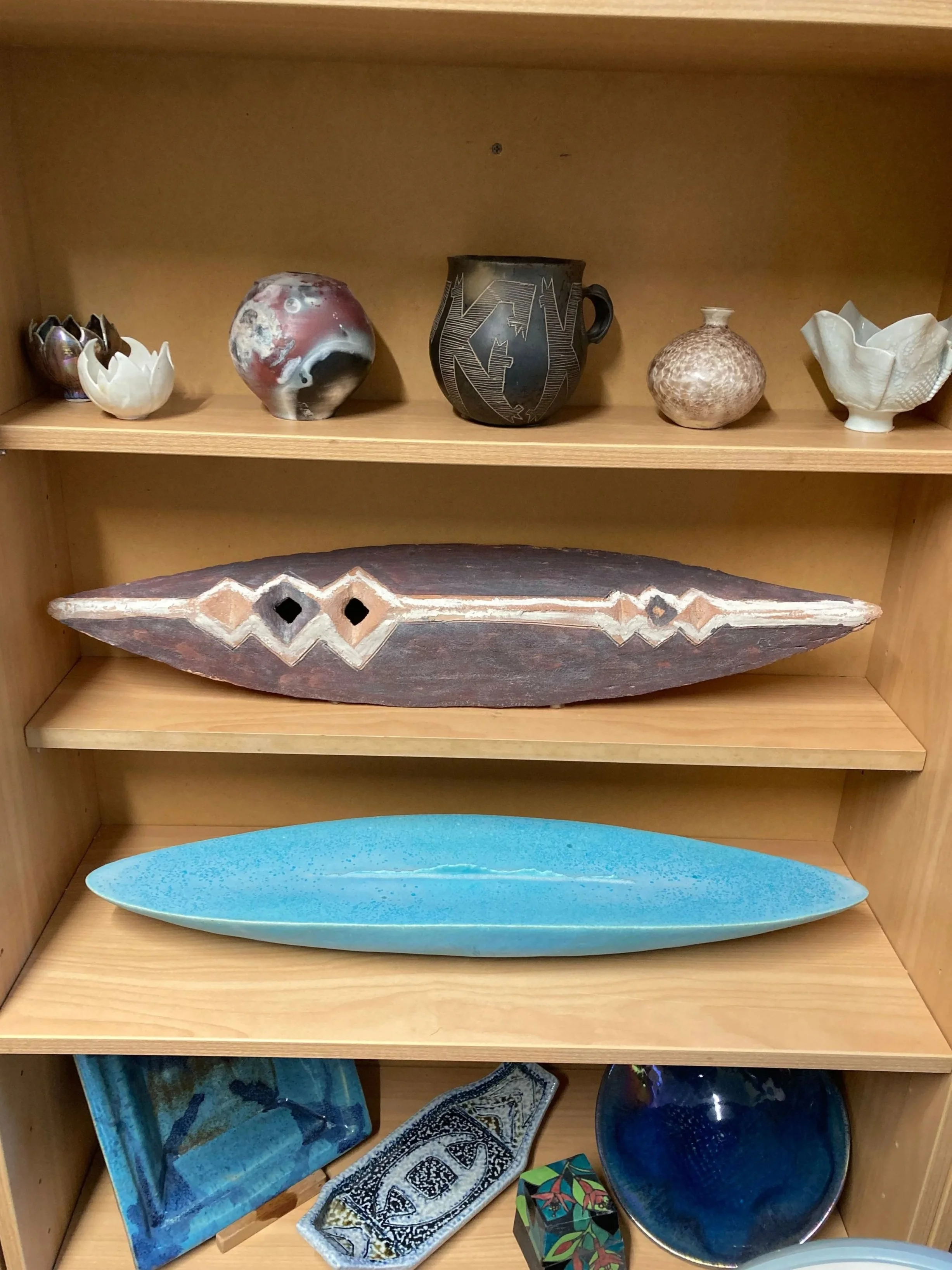 A collection of work on the shelves