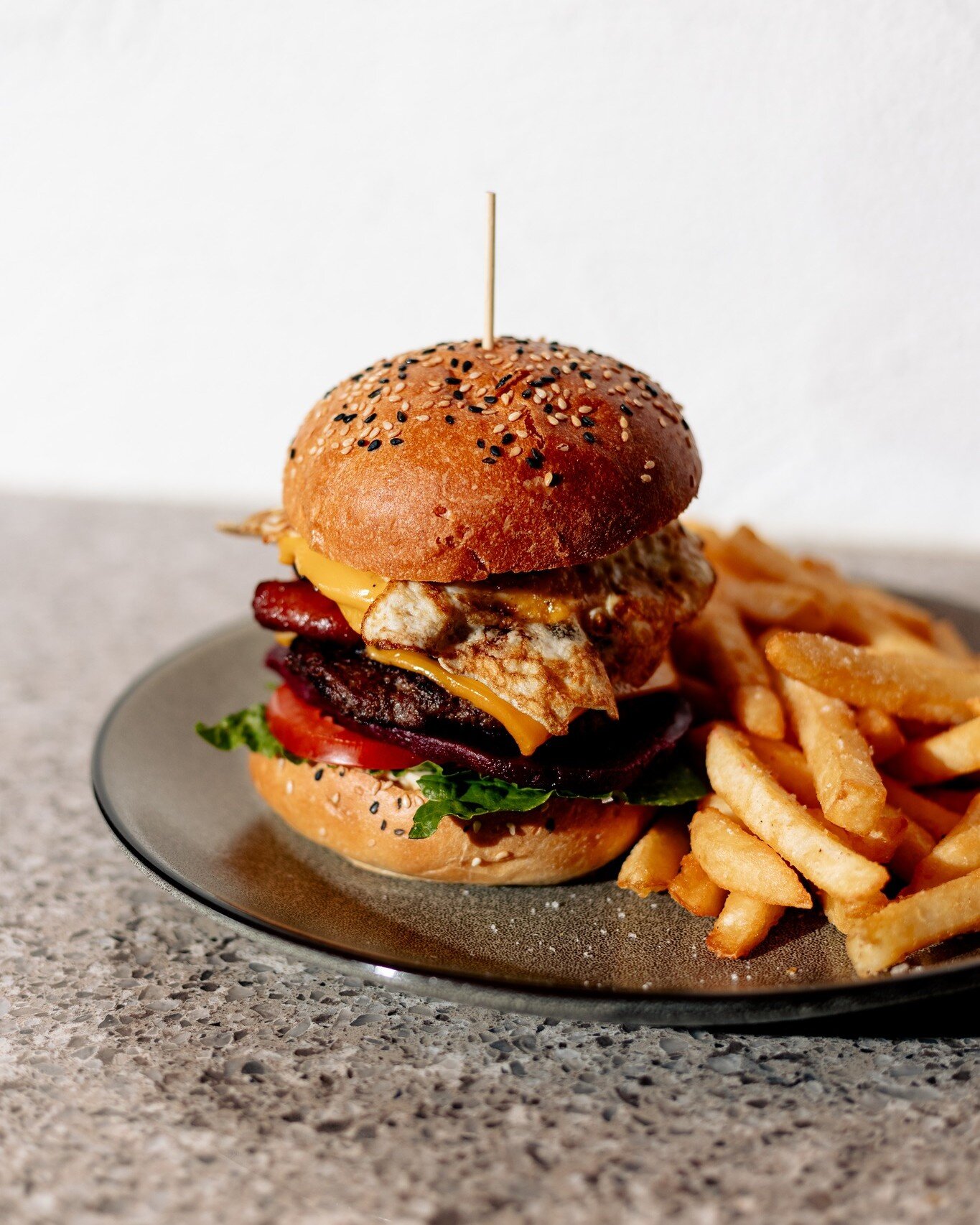 Sink your teeth into 'The Eagle Hawk', featuring double beef patties with bacon and caramelised onions sandwiched between lettuce, tomato, beetroot and fried egg on an irresistible milk bun. 

Served up with chips - it's perfect for any epic appetite
