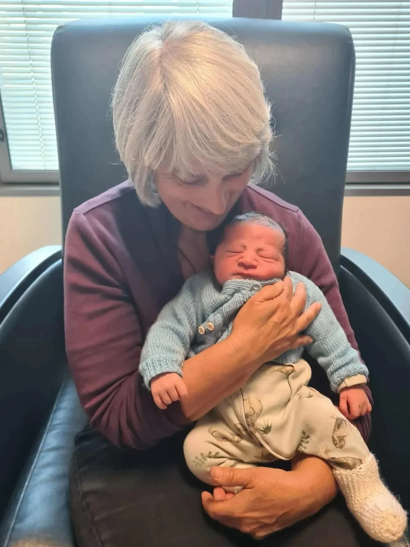 Cradling a New Born Baby