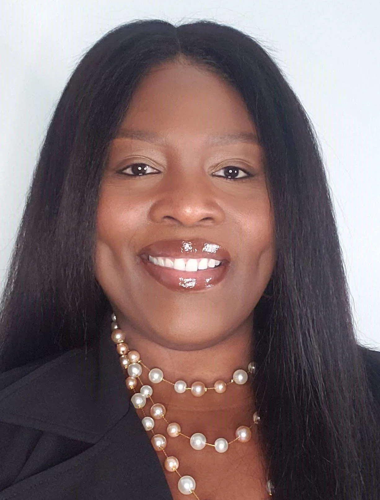 Headshot of black woman smiling