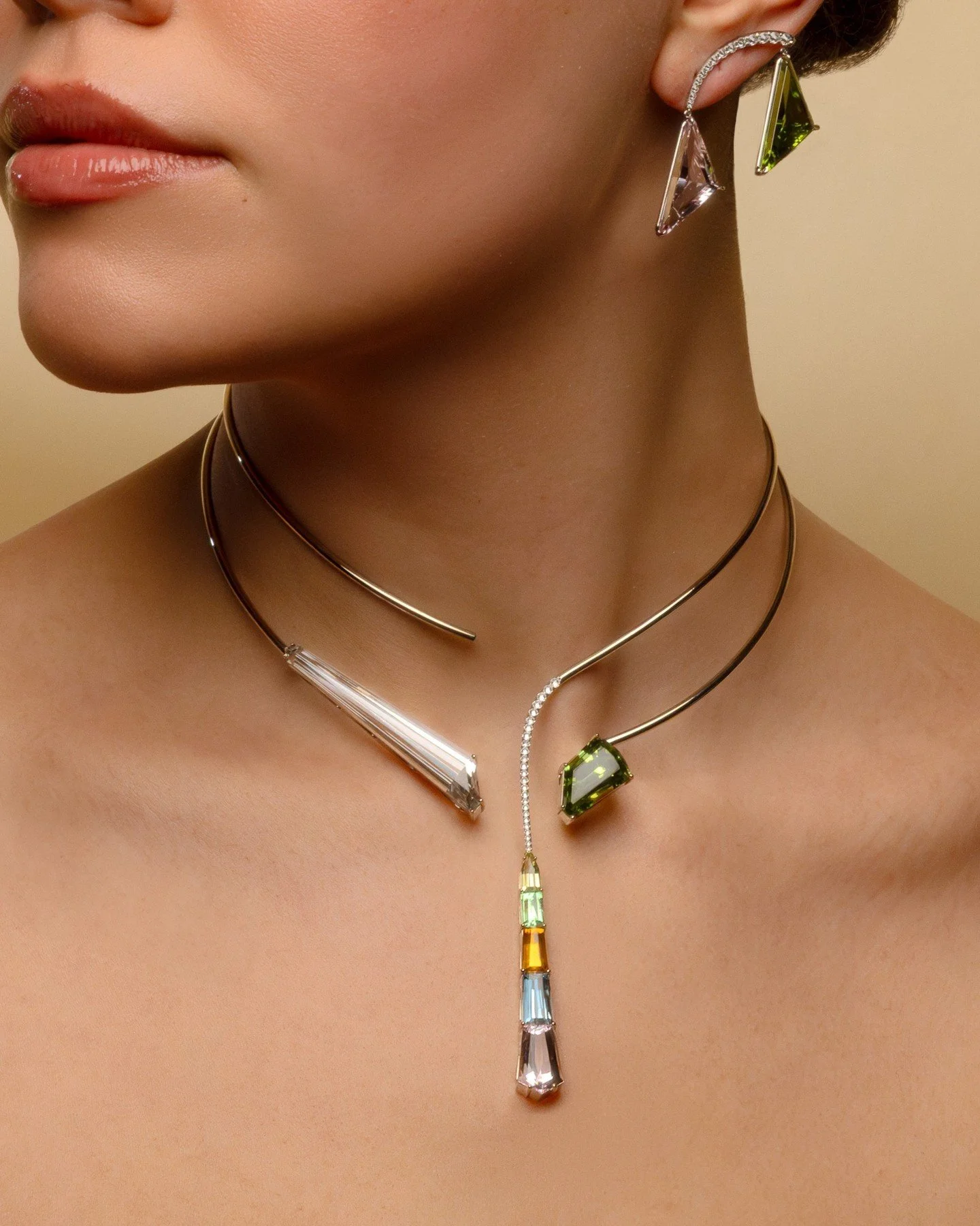 A beacon of modern luxury sits at the confluence of cutting edge elegance and sleek sophistication. Perfect for a walk down the red carpet. Distinct elements merge to create something greater&hellip; this necklace embodies the harmonious flow of vibr