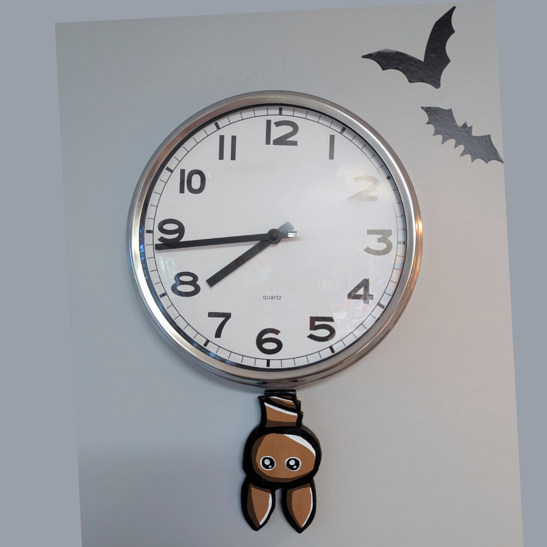 bat under clock.png