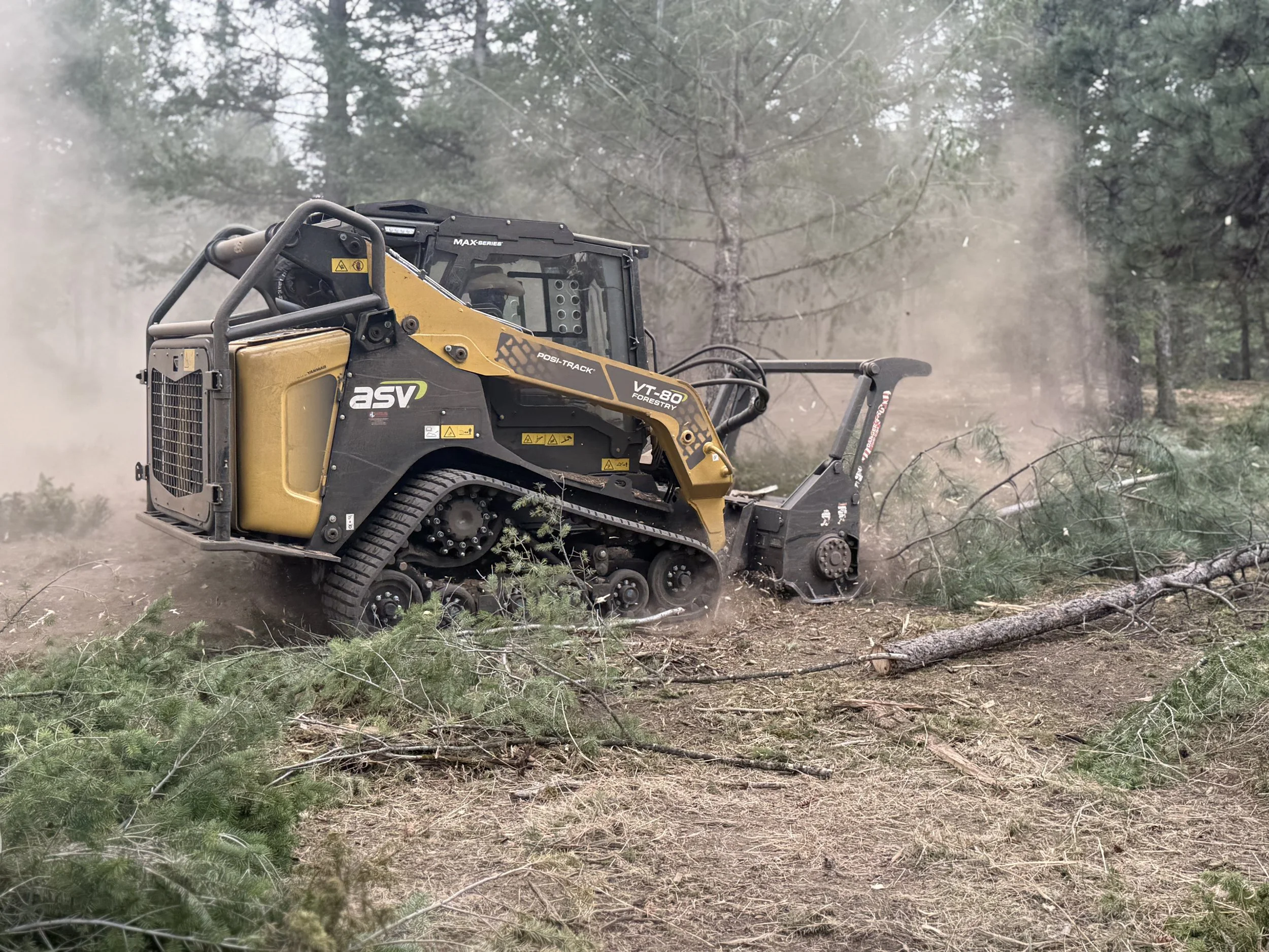 A Forestwerx forestry masticator performing fire mitigation in Colorado