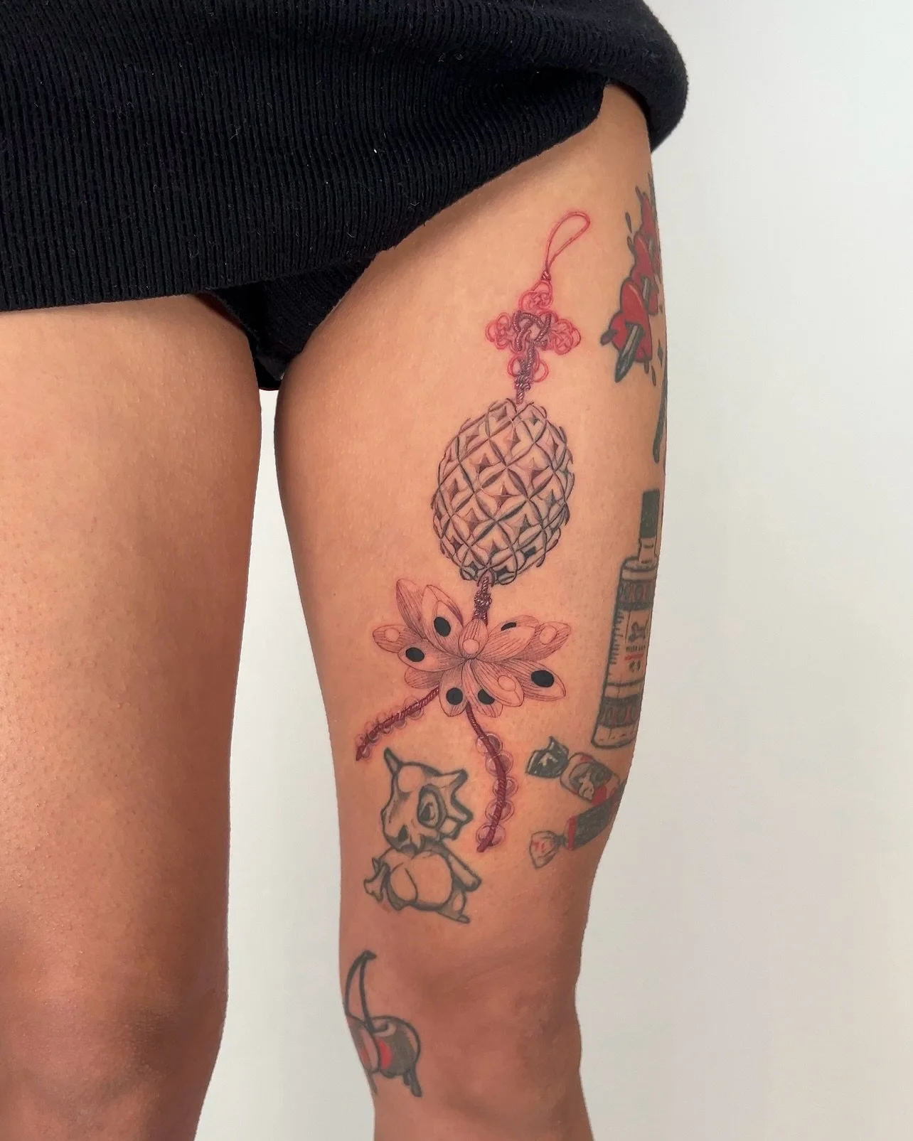 This piece was inspired by a charm from Eva&rsquo;s childhood
Originally of the Buddhist Goddess of compassion Guanyin 
But since it&rsquo;s considered *disrespectful* to tattoo any Buddhist Gods or Goddesses below the waistline, we decided to switch