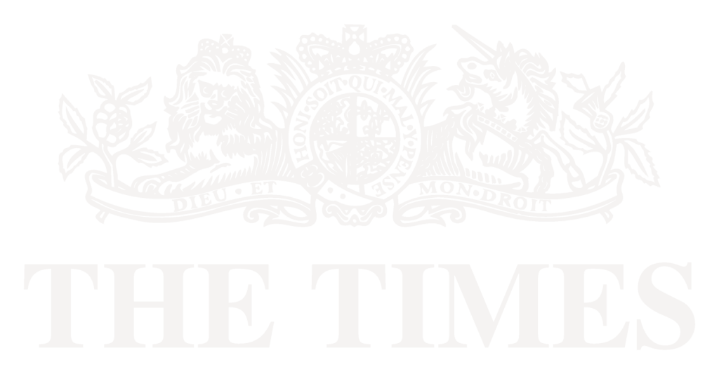 "The Times" logo featuring a lion and unicorn emblem with a crown, floral elements, and a banner.