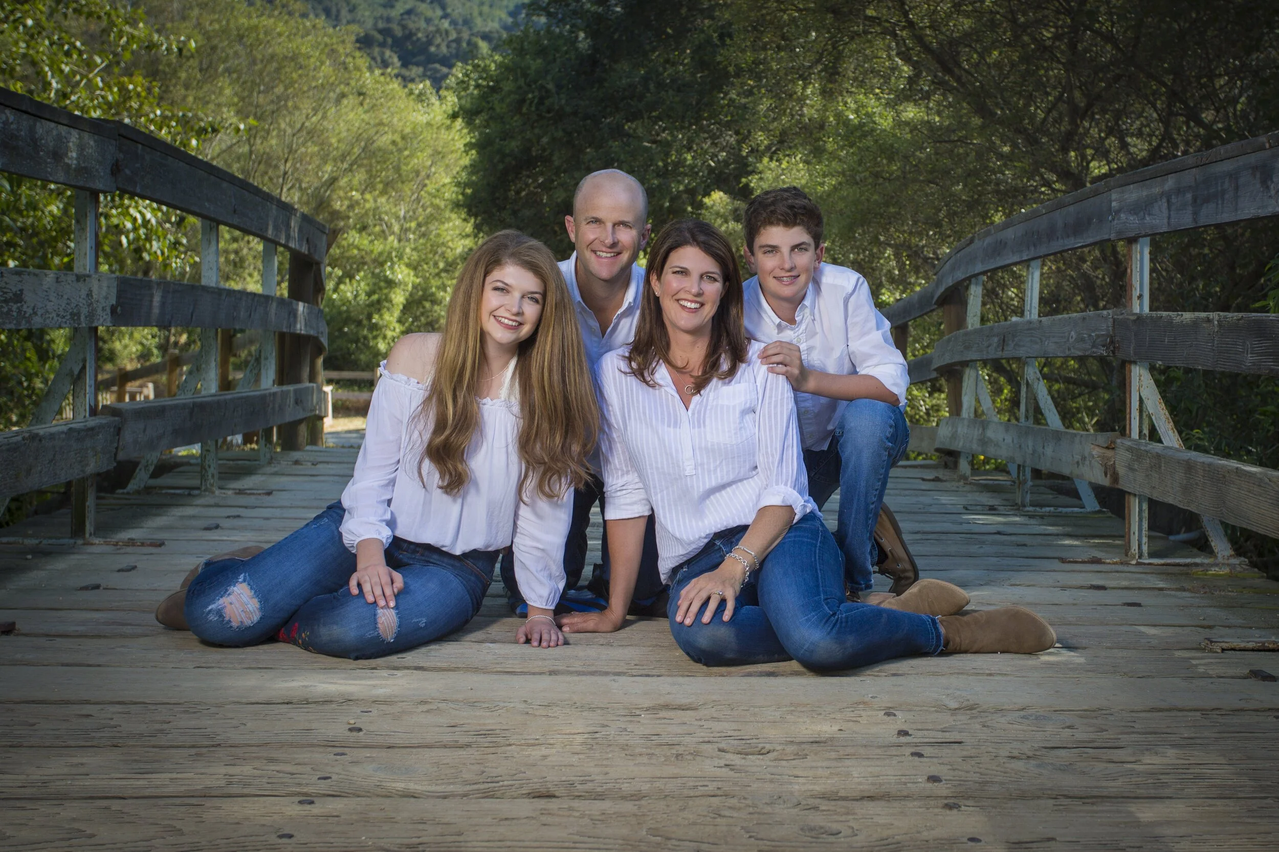 The Carr Family If you know the Carr Family, you know what a special family they are.  It was an honor to take their family portrait!  I don’t know how we got them off their bikes and horses to get this session booked, but we got it done!