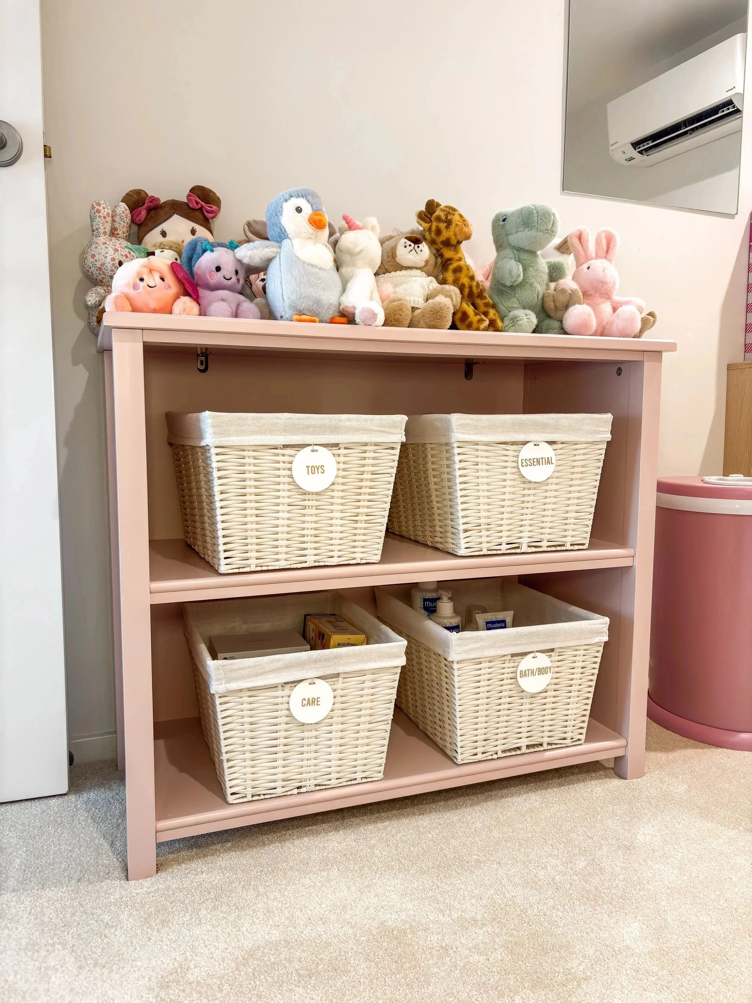 Nursery shelf organised by The Calming Zone Professional Home Organiser in Ascot.