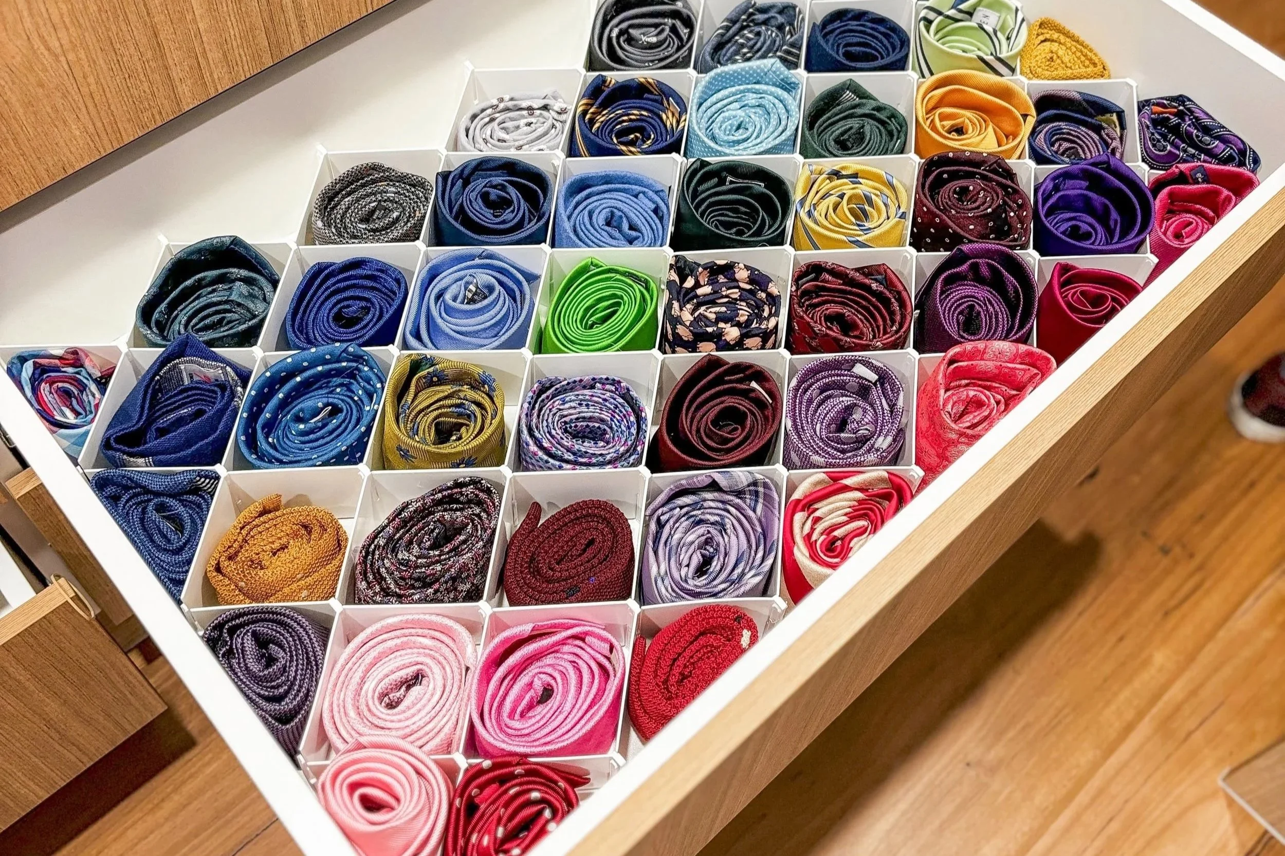 Photo of an organised wardrobe by The Calming Zone, professional organiser in Brisbane.