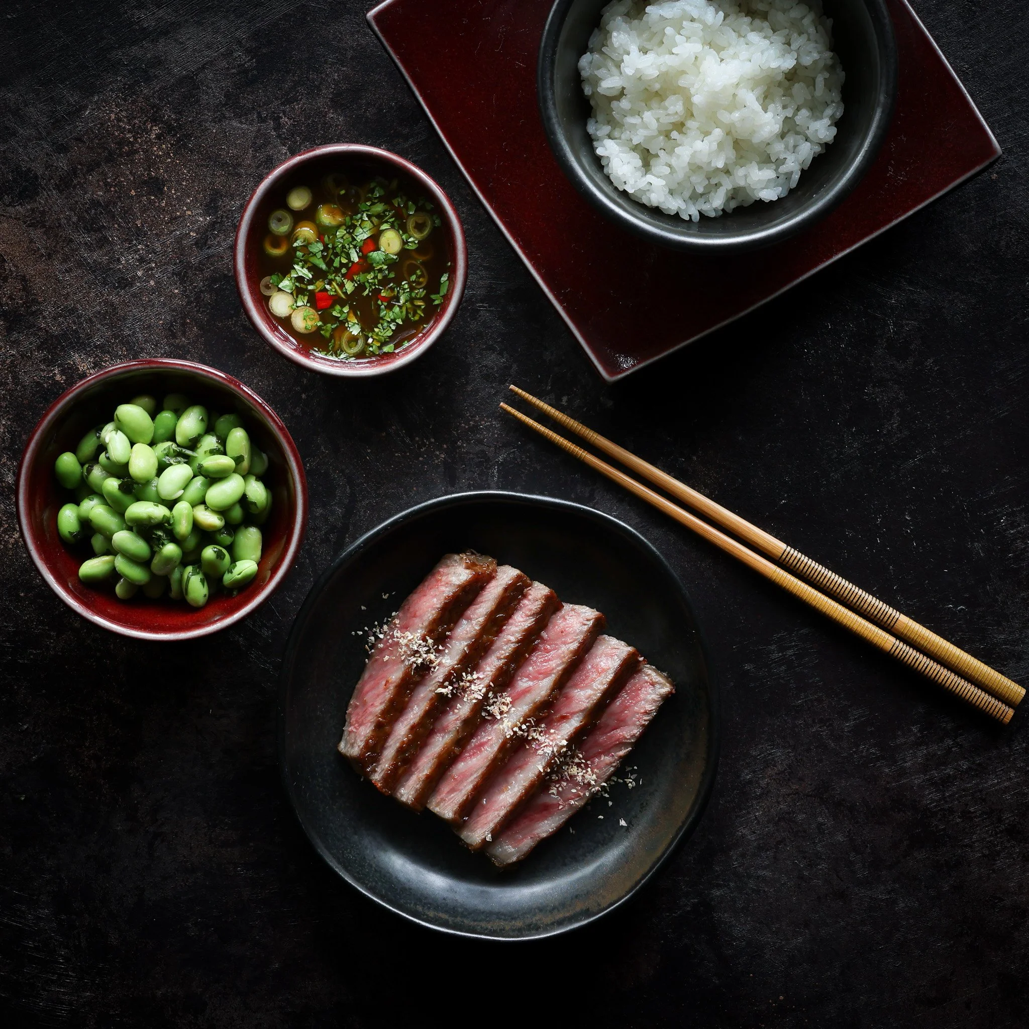 The finest Japanese wagyu beef with edamame beans and rice, styled and photographed for UK luxury food brand Fine & Wild