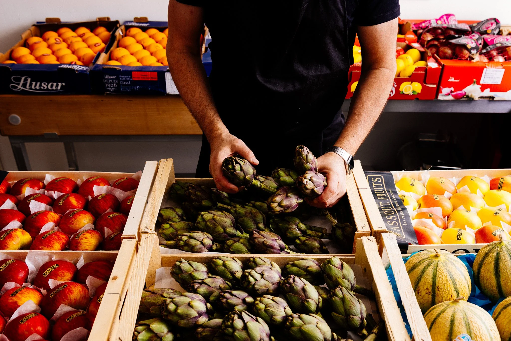 Sorting fruit and vegetable produce, photographed for Fine & Wild UK luxury food brand