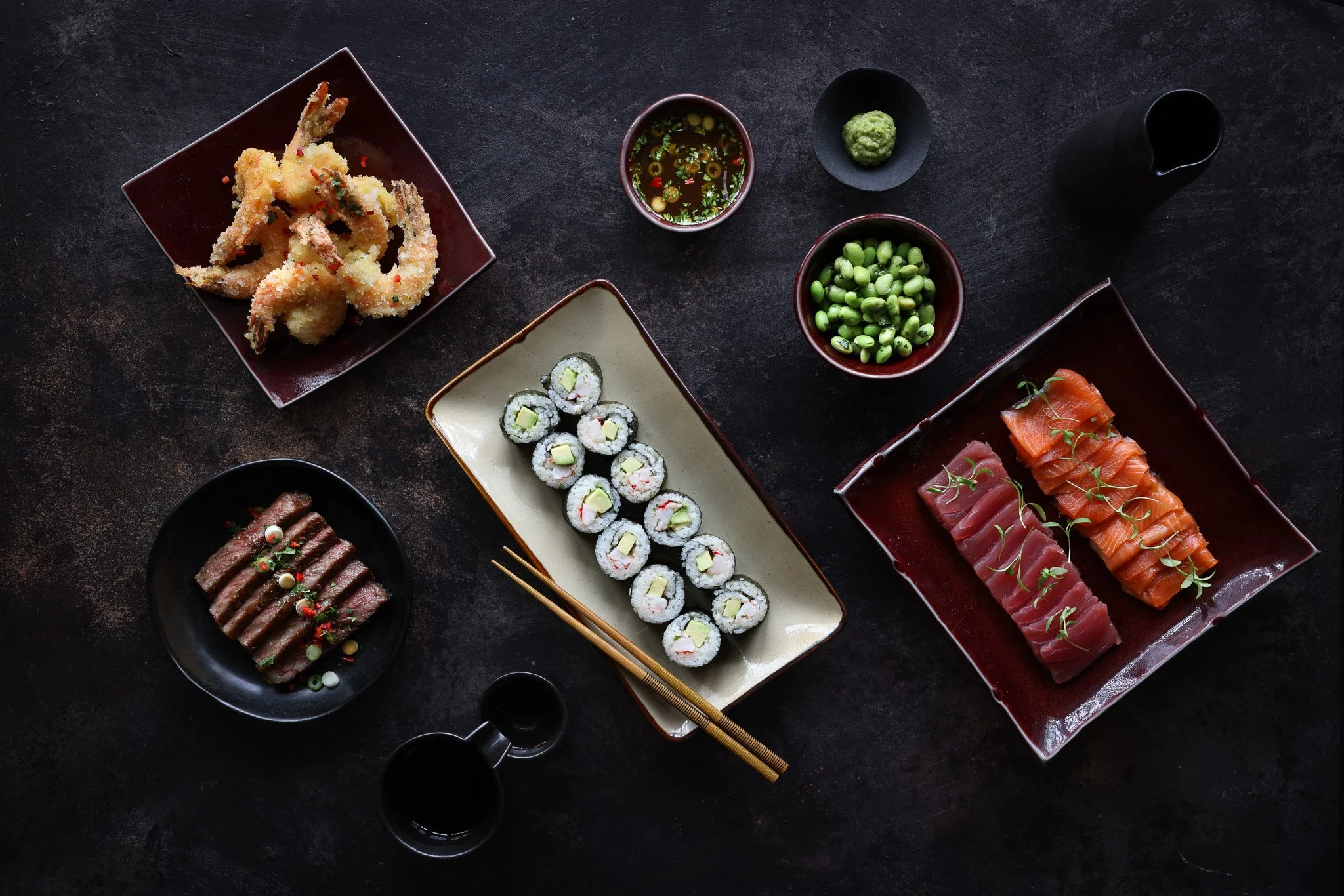 Breaded king prawns, sushi, tuna, wagyu and edamame accompaniments styled and photographed for UK luxury food brand Fine & Wild. 