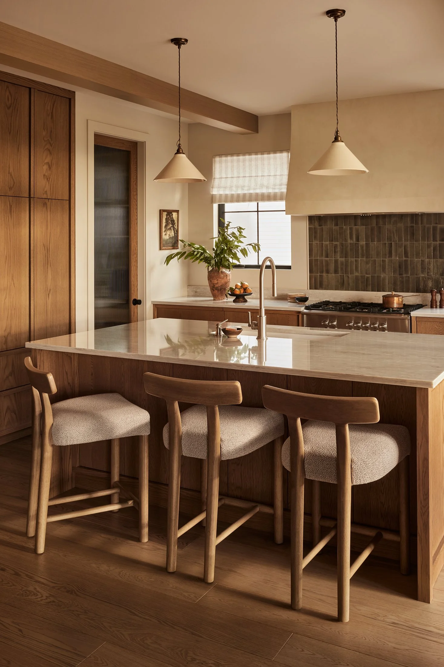 blanc-marine-marie-victorin-residence-kitchen-island-stools.jpg