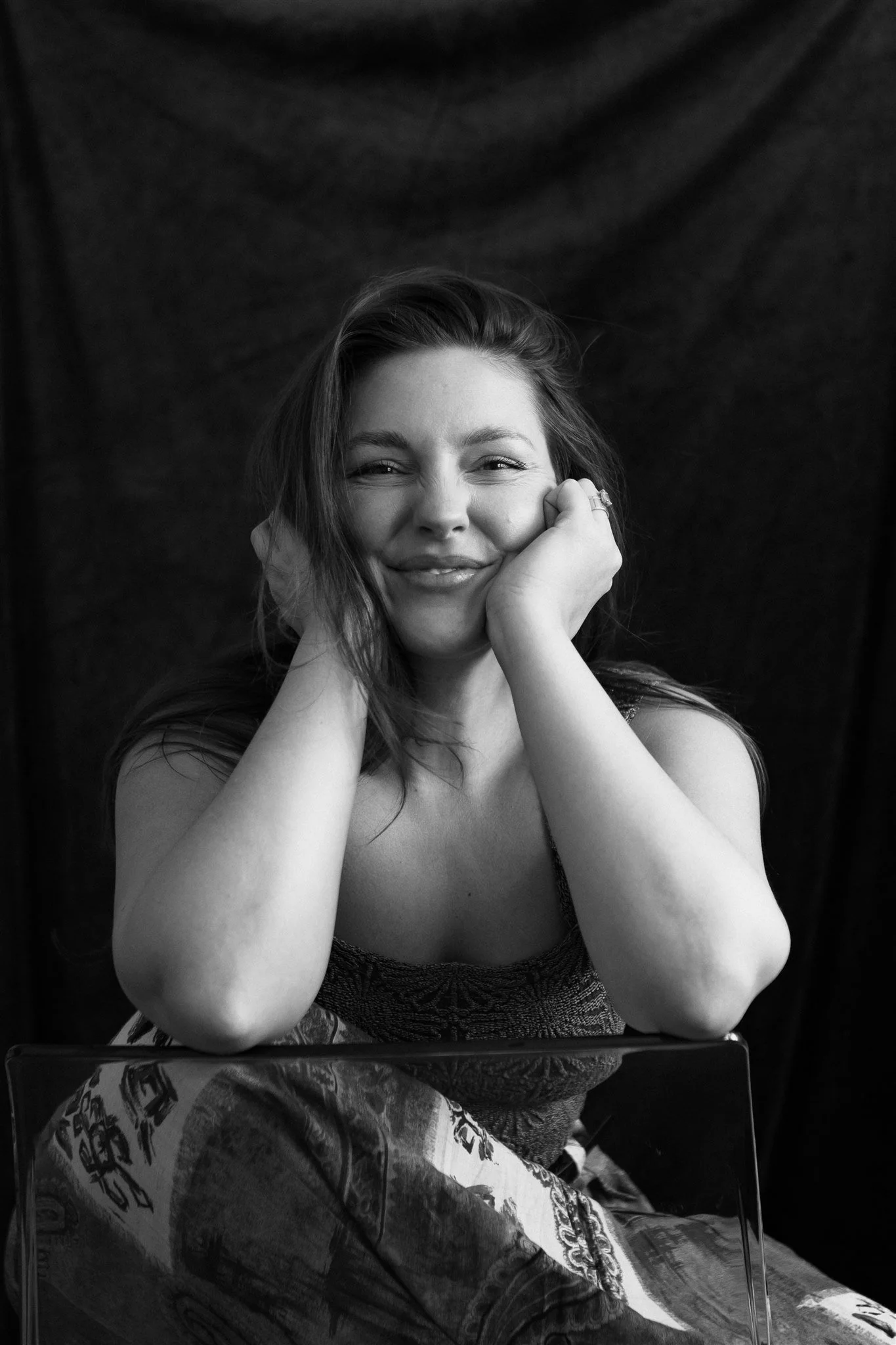 founder Maddie posing in a cheeky headshot