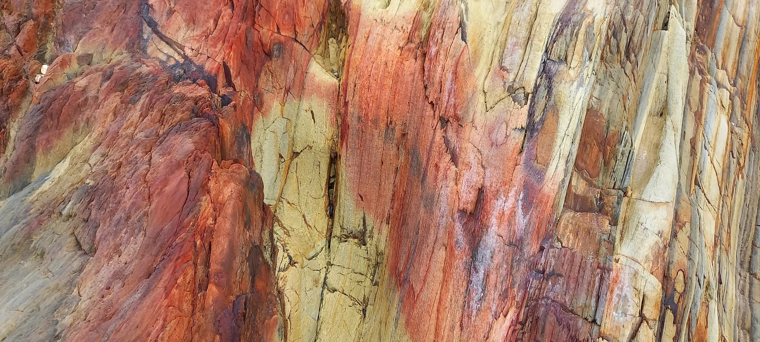 Amazing rock colours and patterns as seem between Seafield and Tara Cove beaches in Co. Wexford
