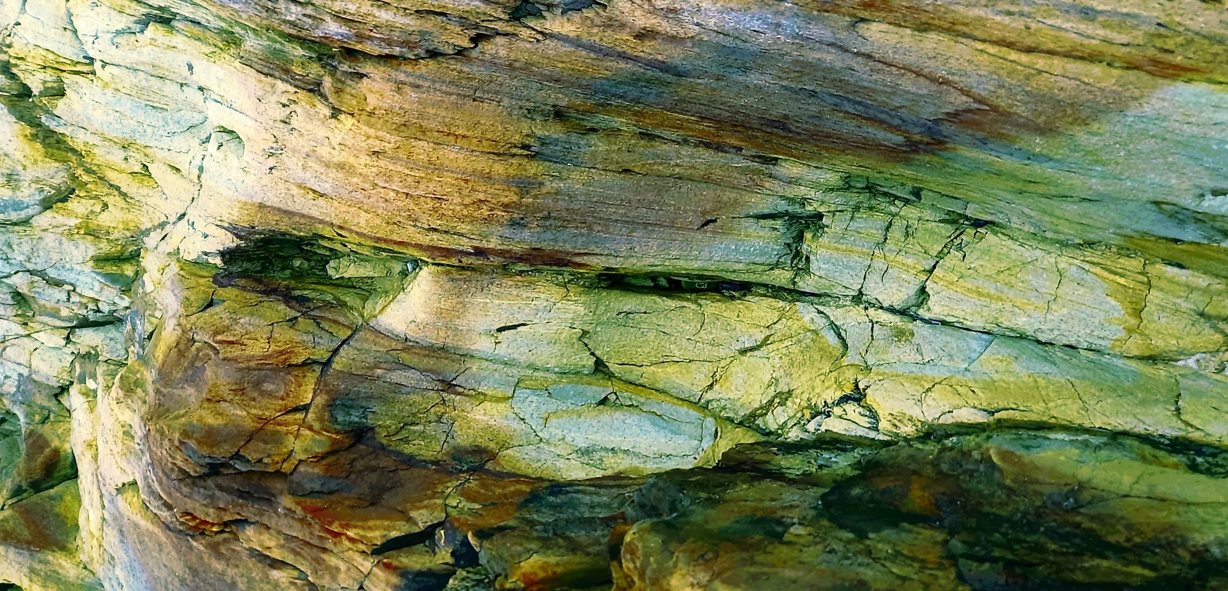 Extraordinary rock colours and patterns as seem between Seafield and Tara Cove beaches in Co. Wexford