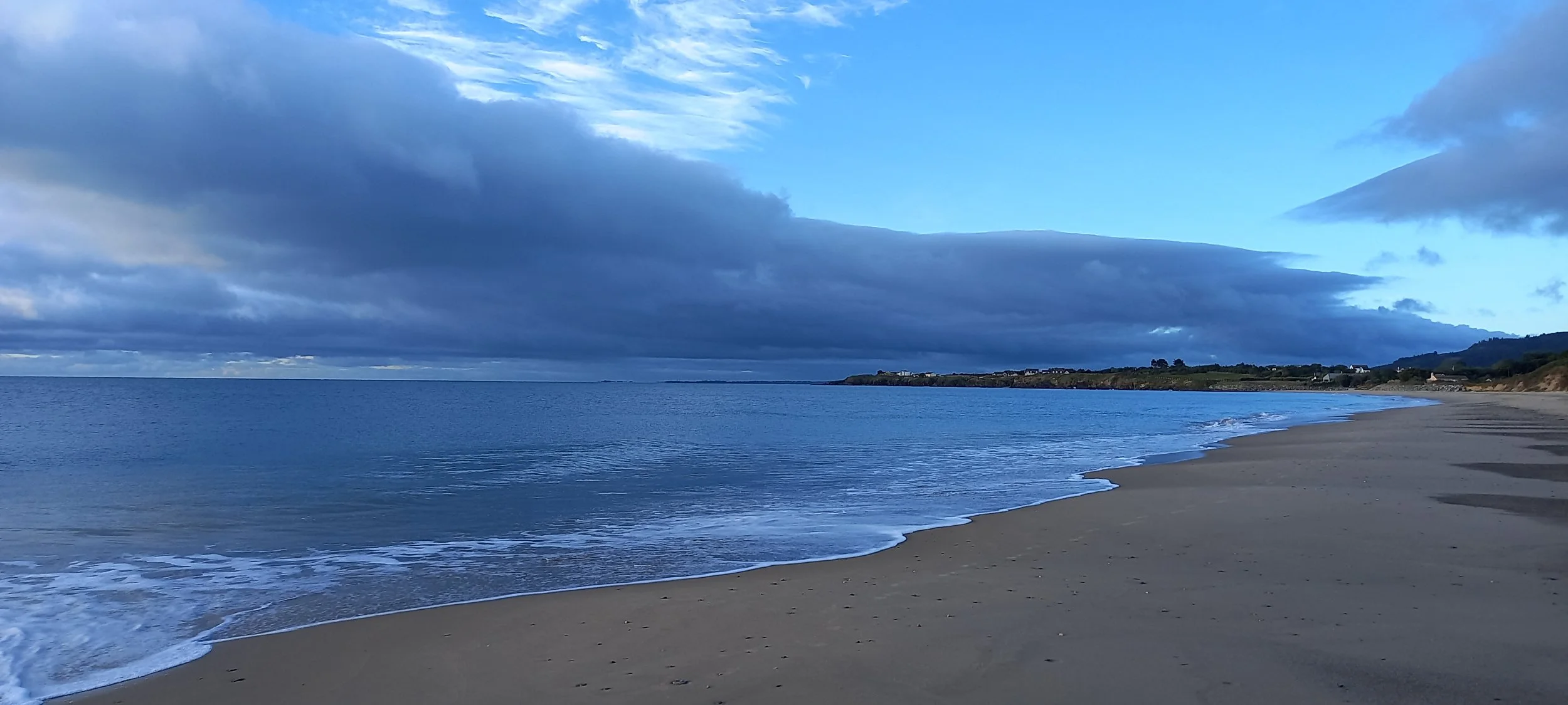 Absolutely true colour and looking like a reflection but not. Looking SE  . .  the sun was rising on the left out of the picture. Kilpatrick to Clones Headland. 07.20 on 16th. September 2026