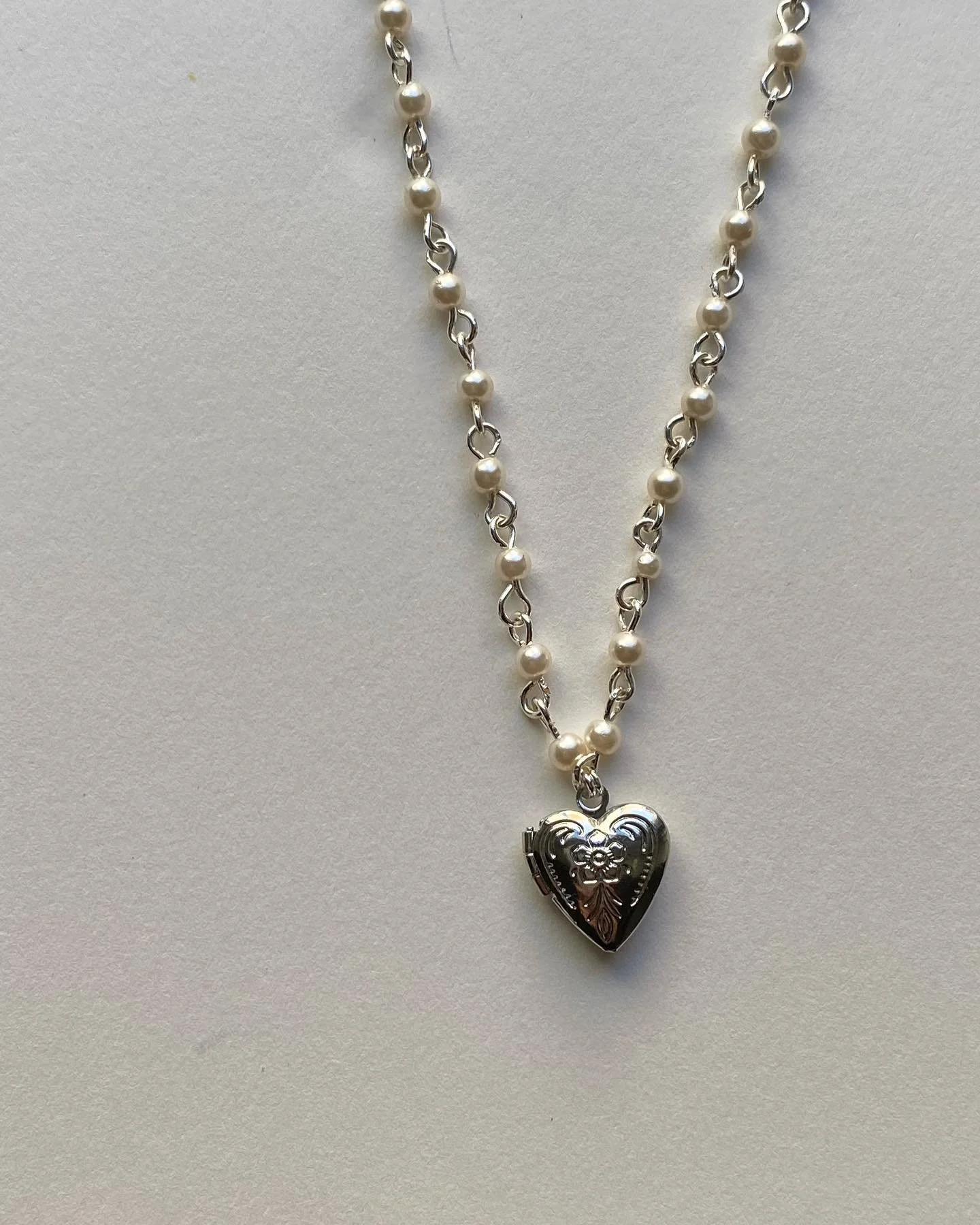 Pearl&amp;Locket 

Limited Stock. Link in bio🫶🏽 

Faux pearl $25 
Available in gold and silver
