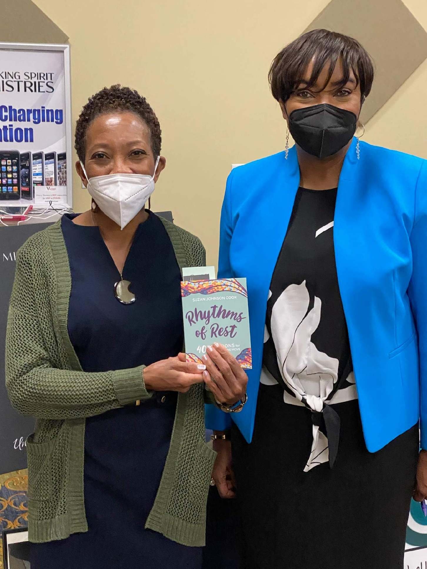 Dr. Boone-Thornton (2022) autographing the Rhythms of Rest 40 Devotional book for Dr. Lisa McCoy a preventive medicine physician in Henrico, Virginia