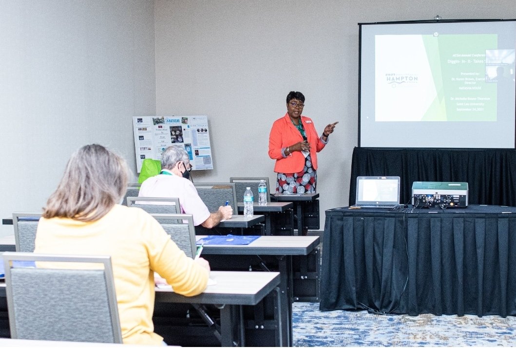 Dr. Boone-Thornton (2021) presenting at the American Community Garden Association Conference in Hampton, Va. Sharing the story of entrepreneur moms from the Natasha House “Diggin-In-It-takes SEED”
