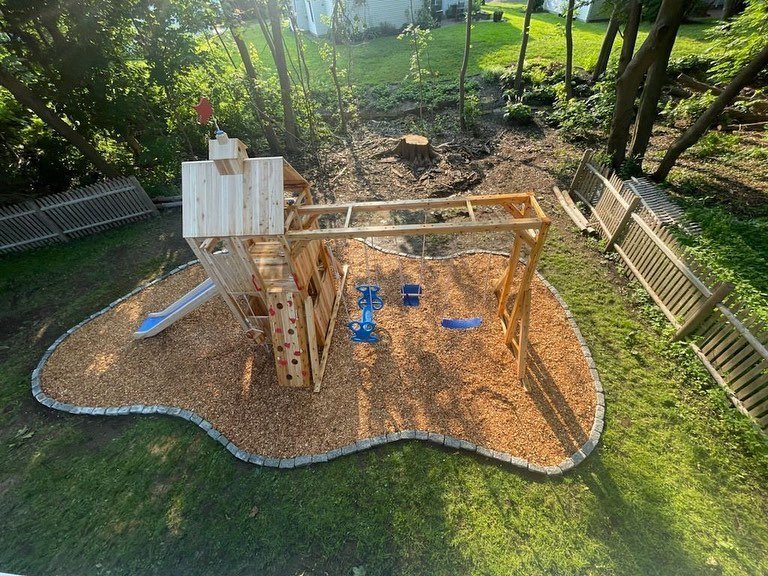 Talk about views 👀👀

- Northern Cedar Wood Fibers &amp; A Cobble Stone Border In A Natural Shape -
 

#wedoplaysites #cedarworksplayset #playisbeautiful #play #outdoors #yardgoals #playset #safetysurfacing #summervibes #summer #cedar #playscapedrea