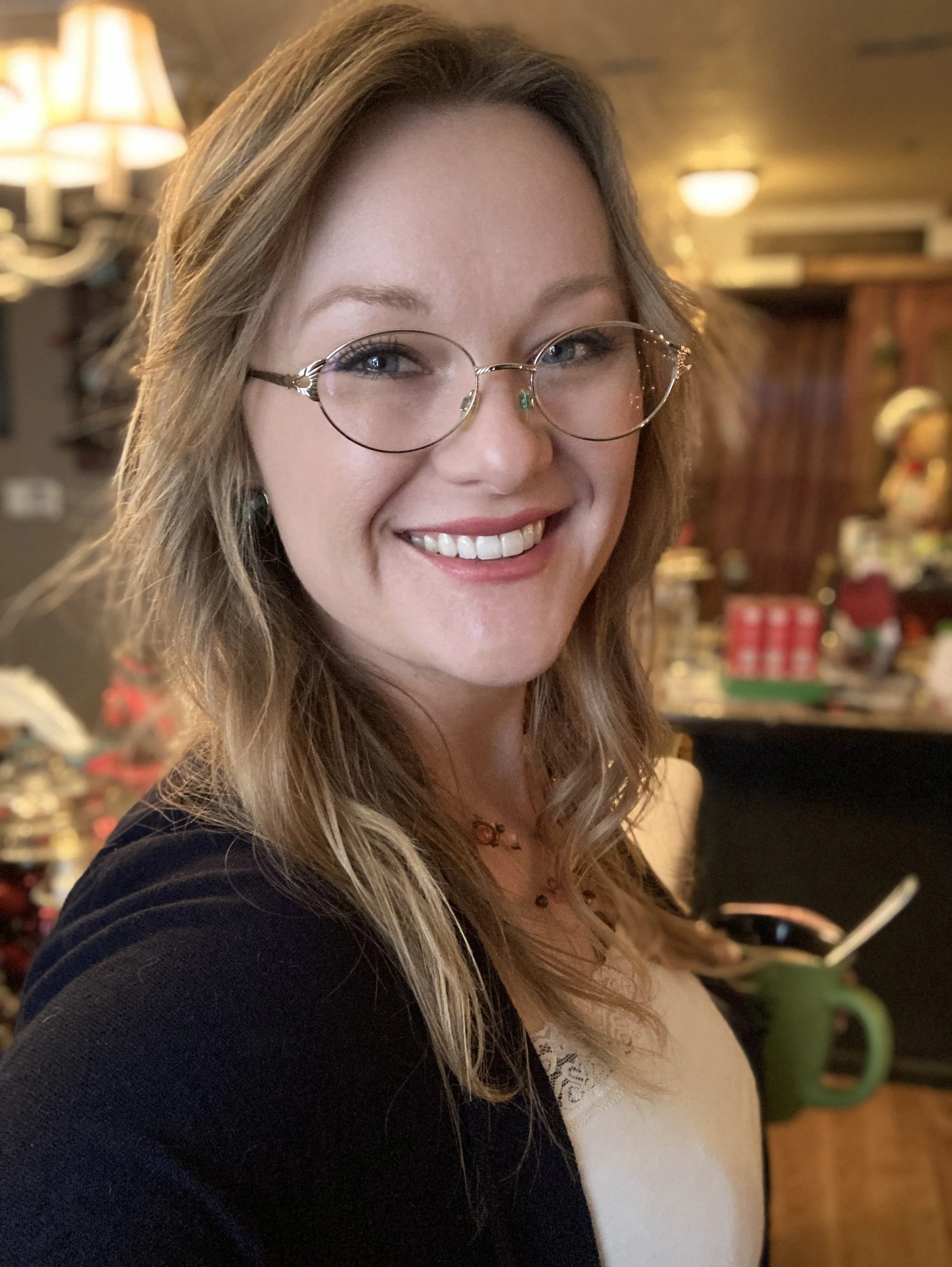 Brittany Taga poses for a photo and shares a story about how God gives grace to the humble