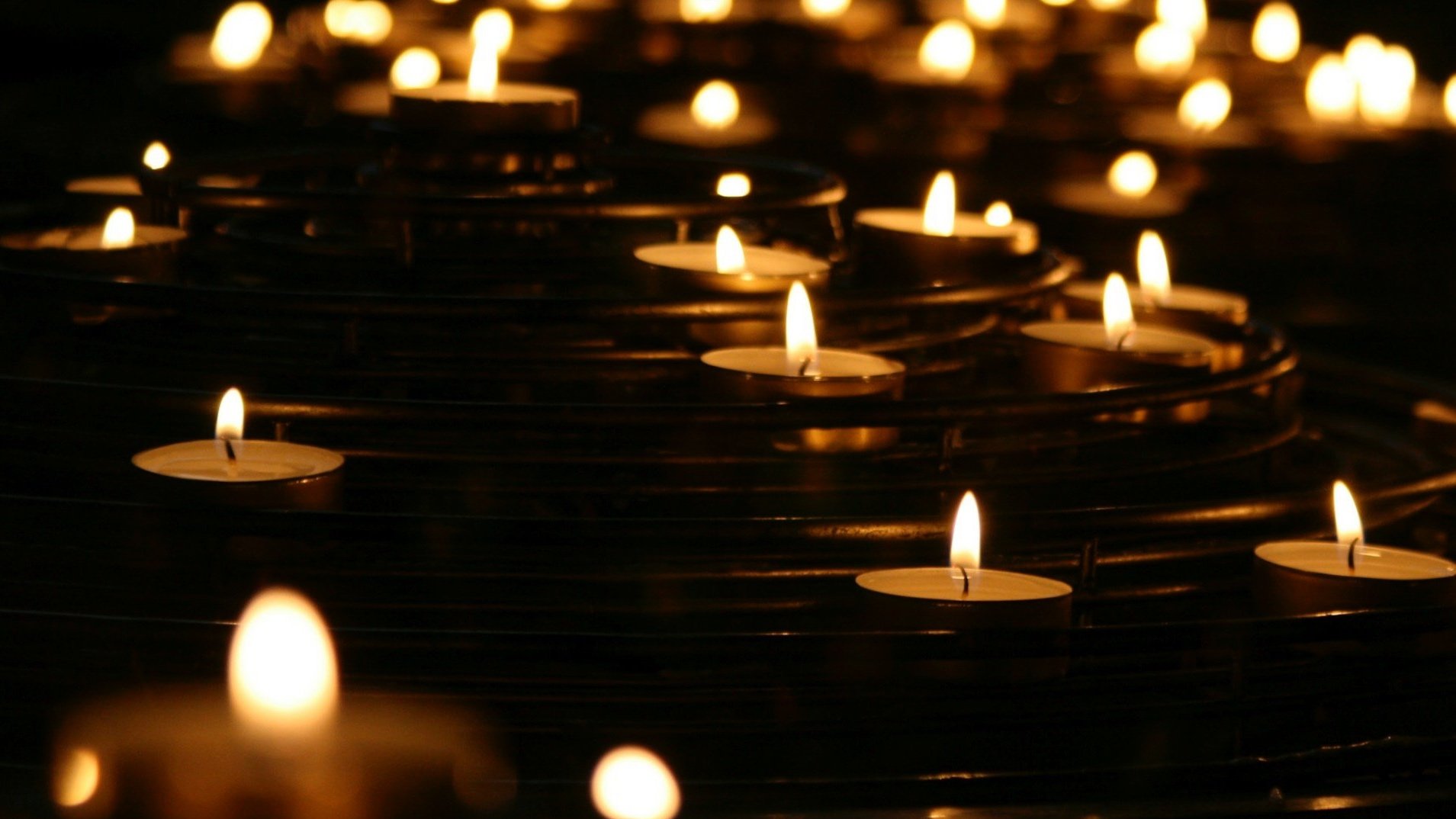 A row of candles are put out to remember a loved one who passed away.