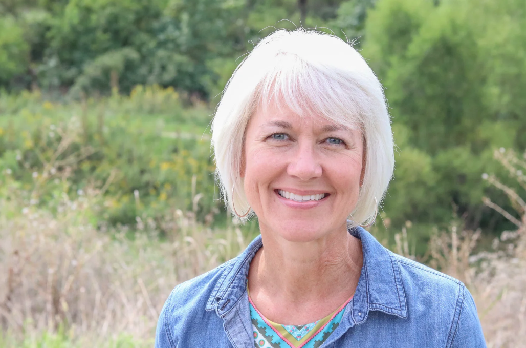 A mother poses for a photo. She shared a powerful Christian answered prayer testimony of healing and God’s faithfulness with Faith Storytellers to encourage and inspire other believers.