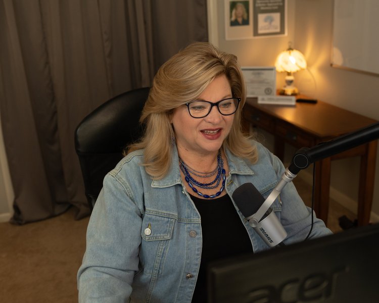 Teresa Youngstrom recording her podcast