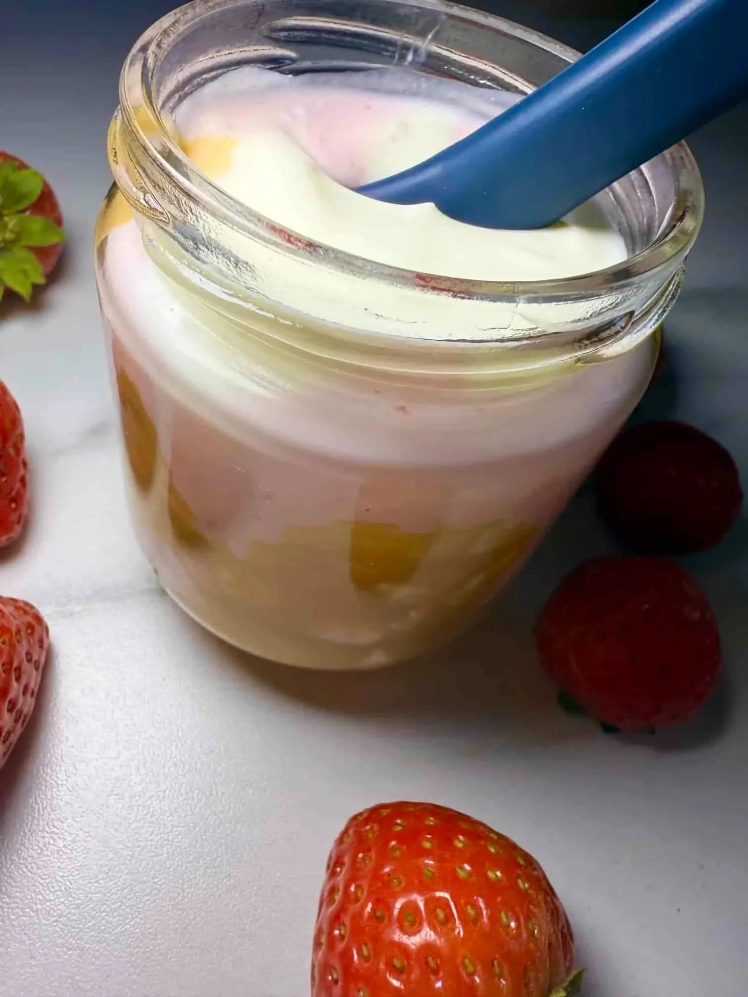 Cottage cheese, strawberries and Greek yogurt combined with a swirl of peanut butter and served in a jar with fresh strawberries