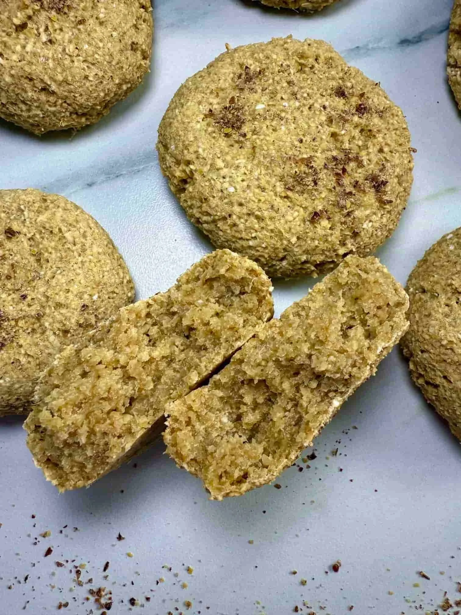 Close up image of a mango cookie, small enough for little baby fingers