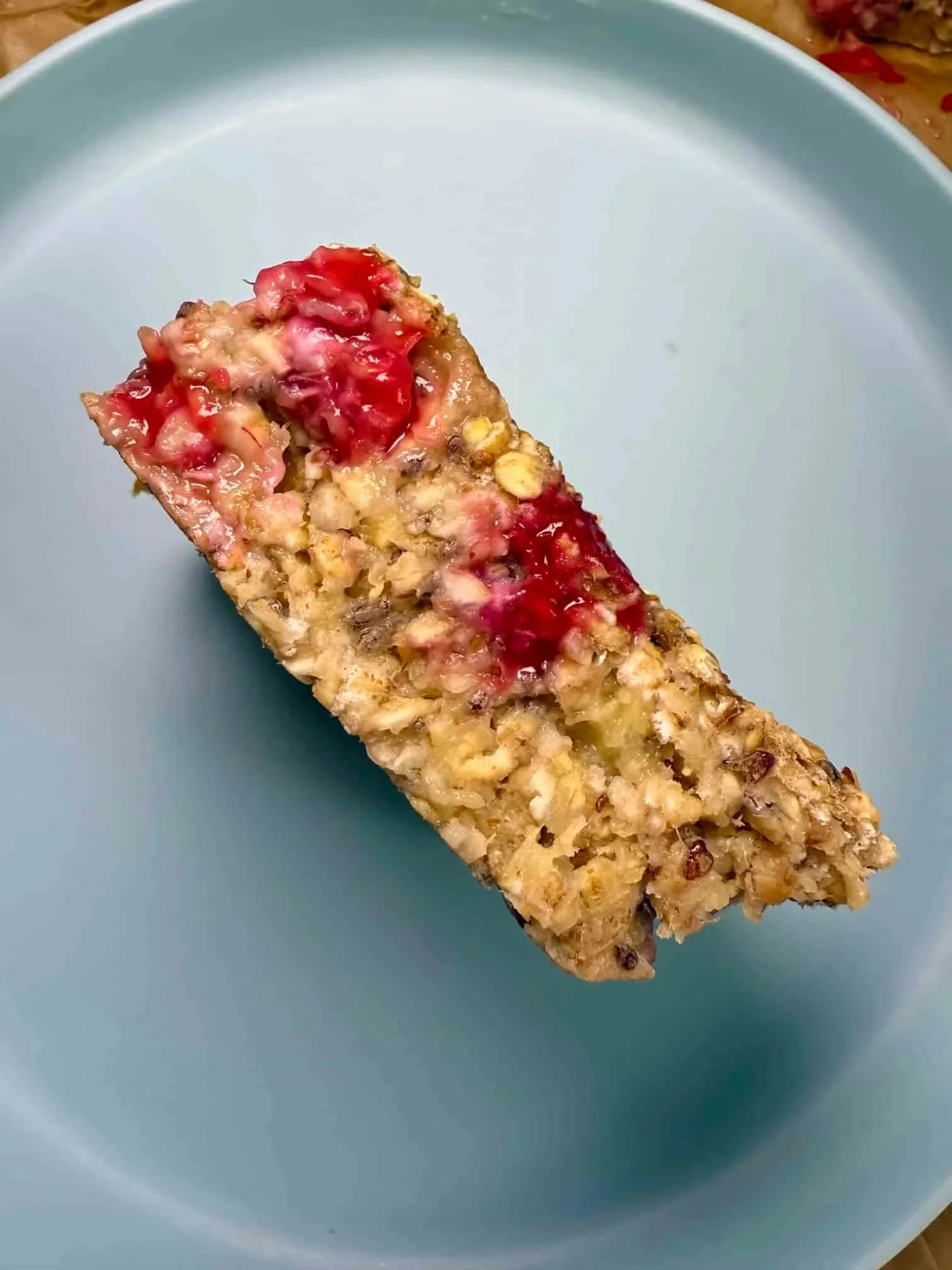 Close up image of a single baked porridge "finger" bar
