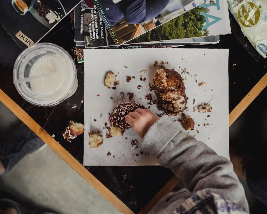 An example of baby led weaning with toddler messily eating some food