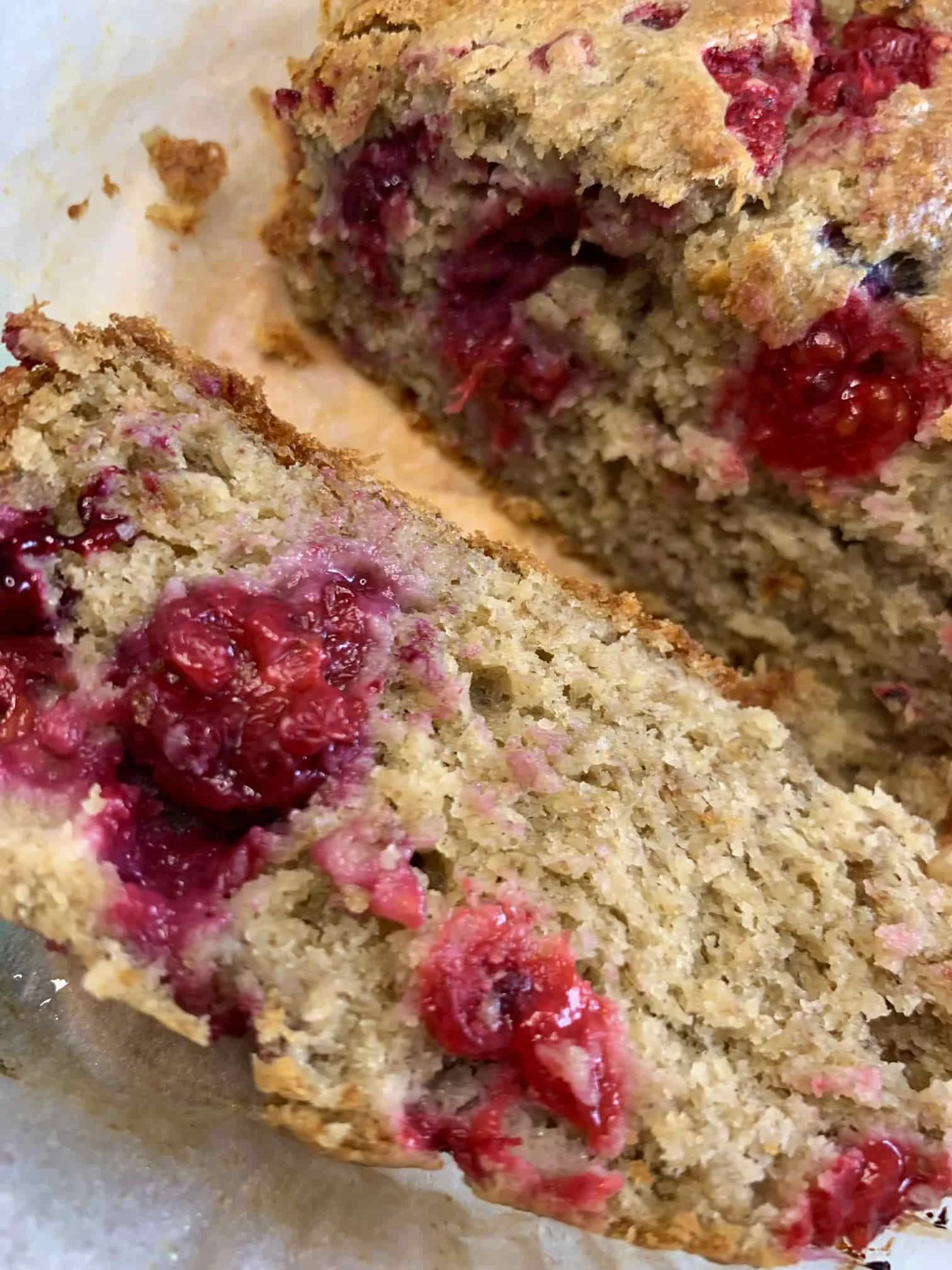A close up image of some Weetabix loaf cake with raspberries prepared especially for baby led weaning