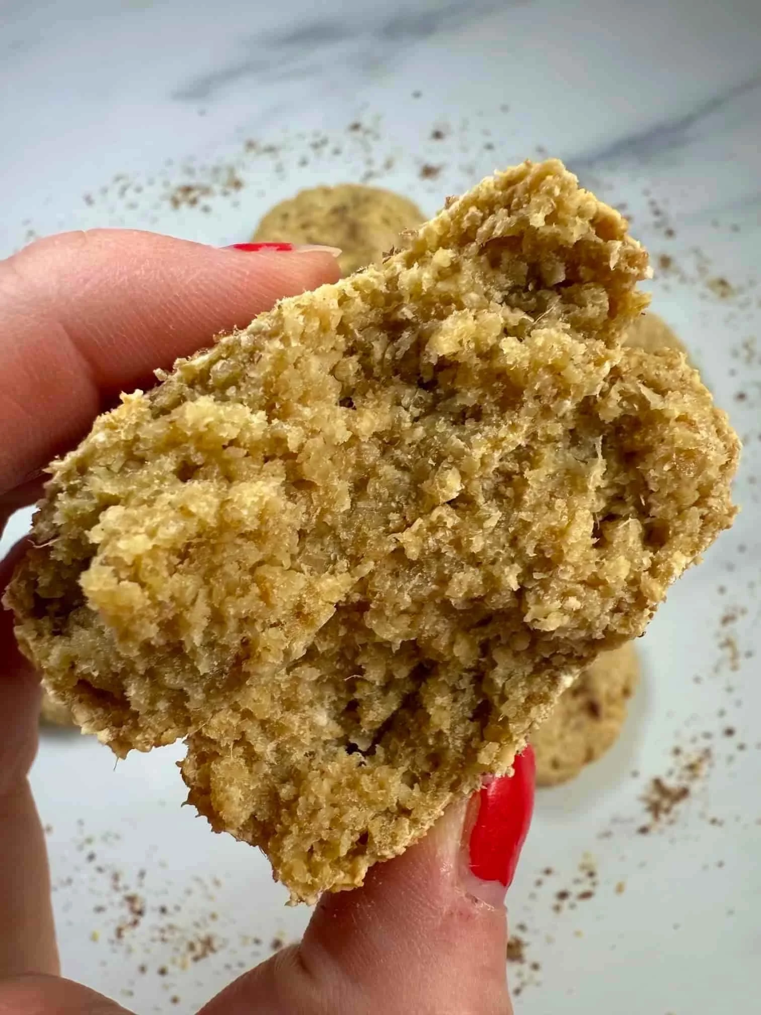 Close up image of a mango cookie cut in half