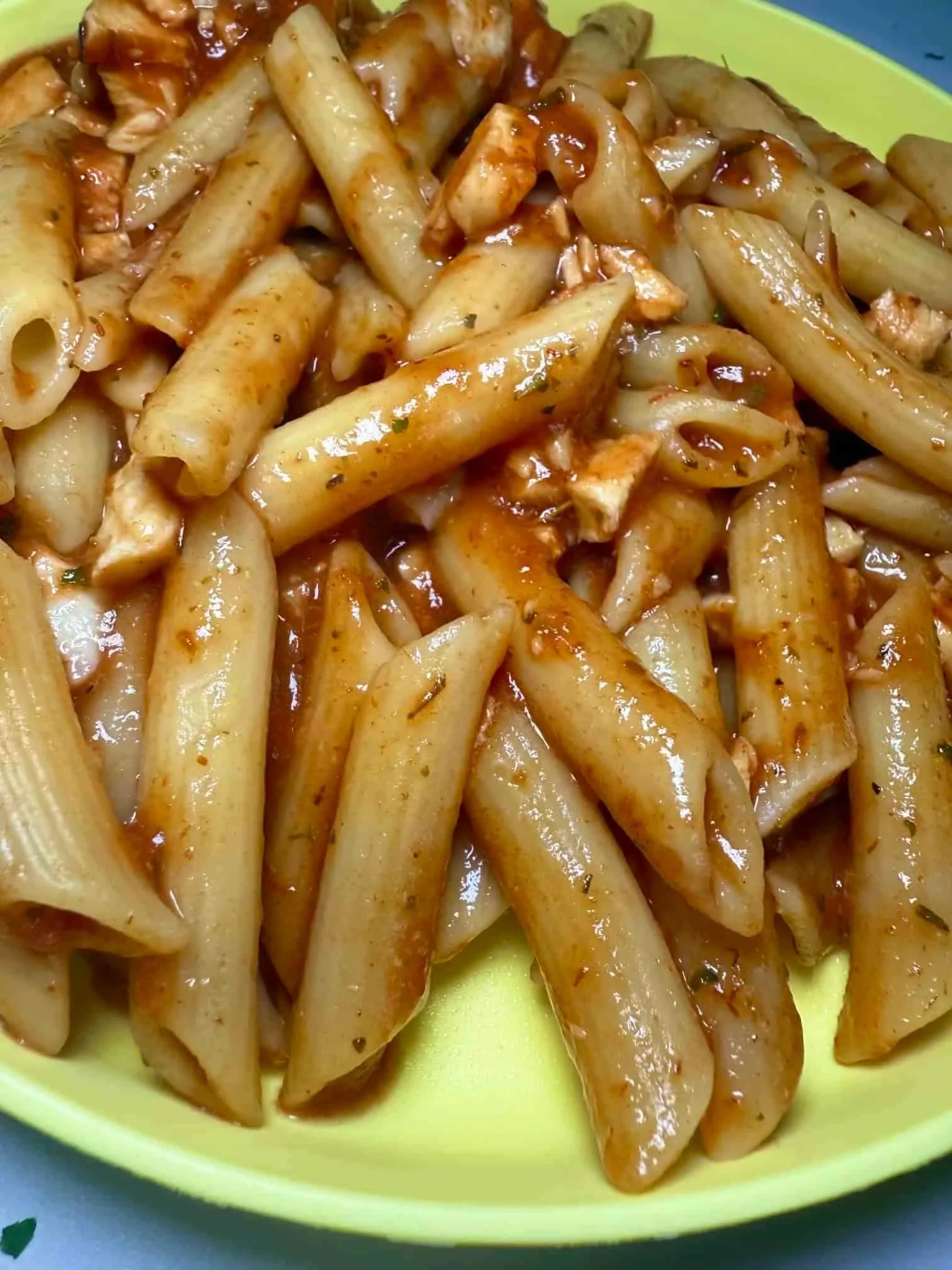 Leftover turkey pasta served on a toddler plate
