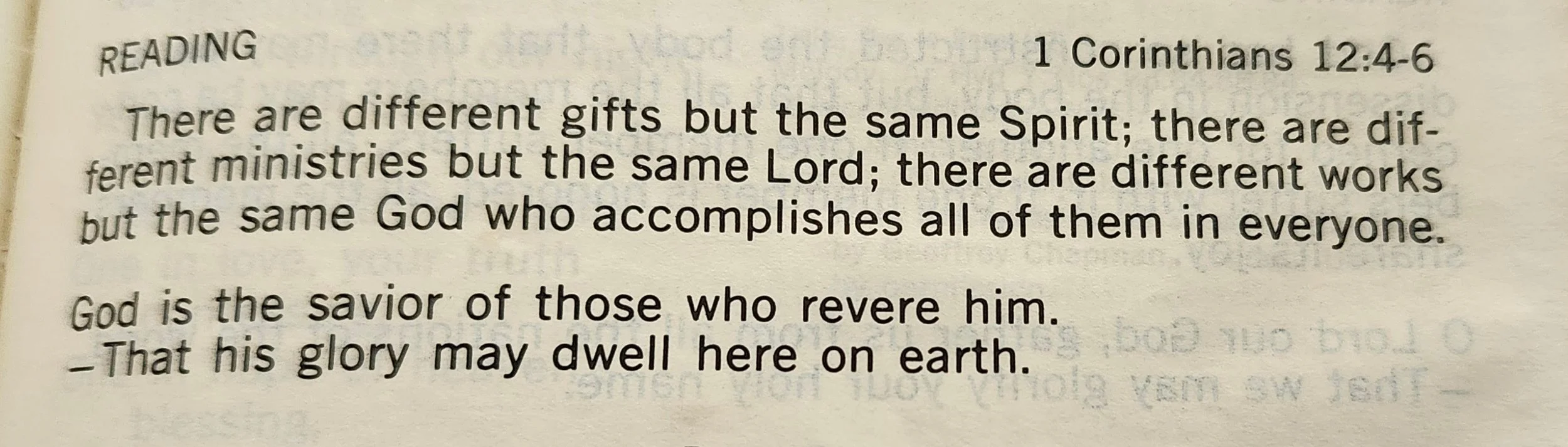 Bible page with a reading from 1 Corinthians 12:4-6 about gifts and the Lord, mentioning God as the savior and the glory dwelling on earth.