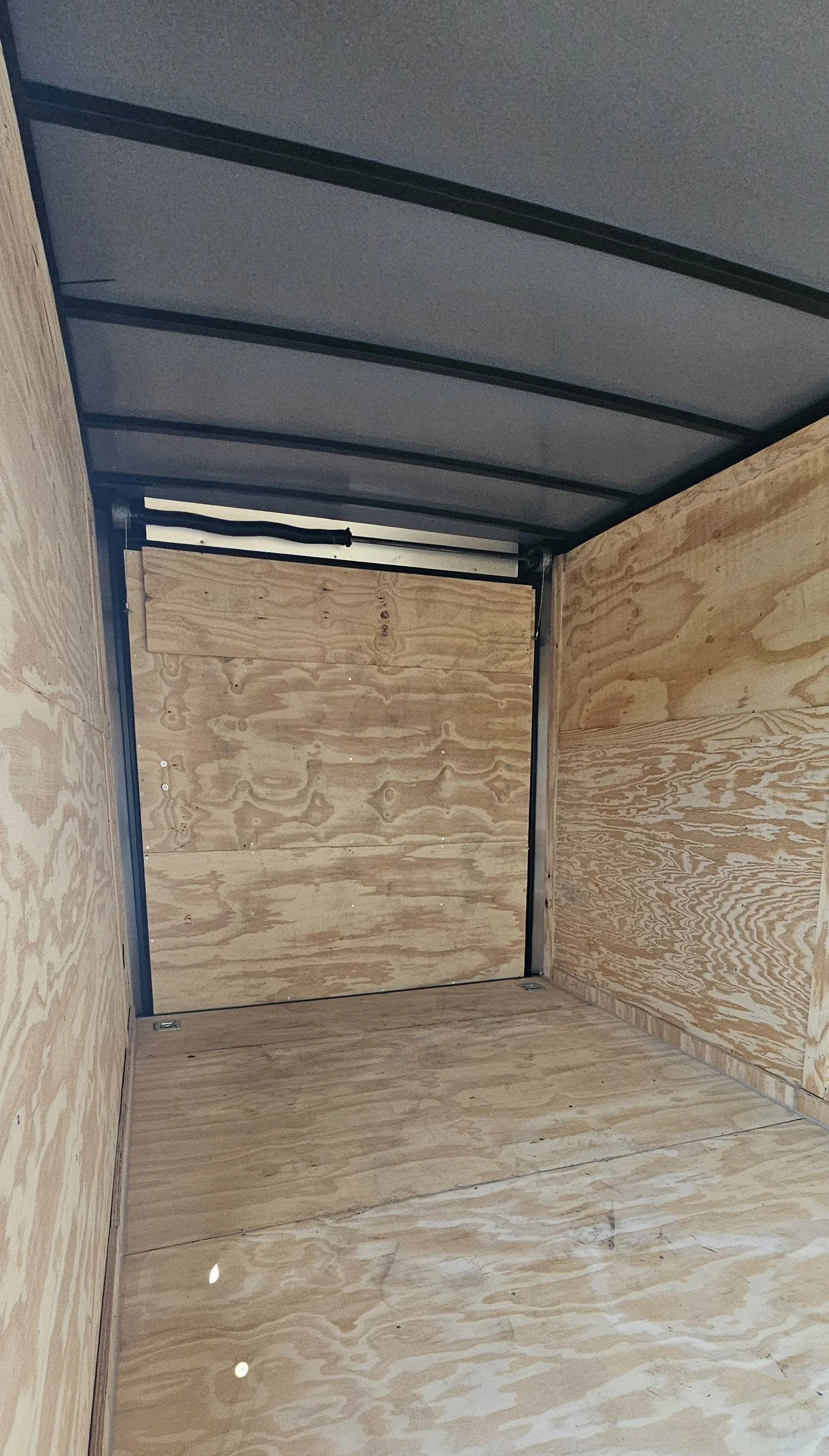 Interior is plywood trim with cool seal roof