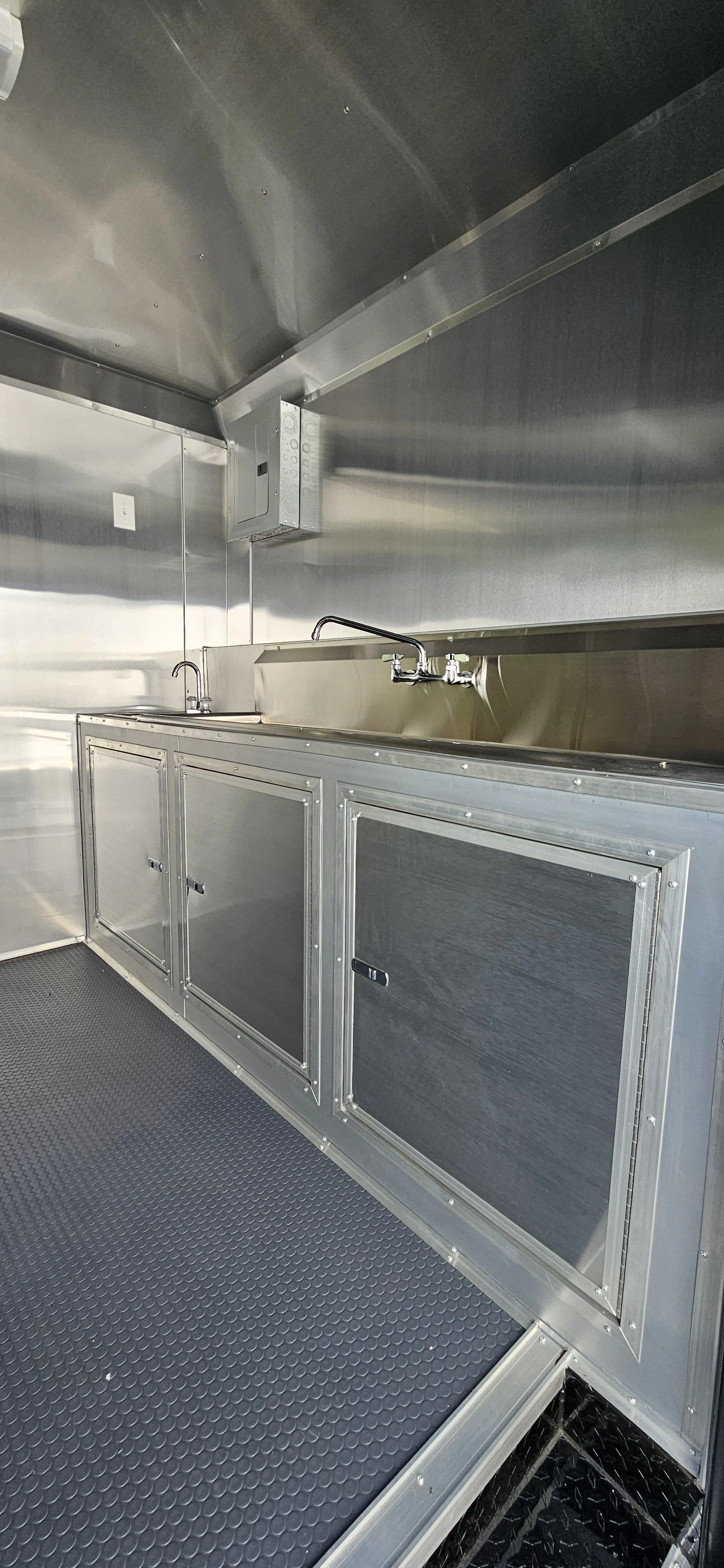 stainless steel interior and sink of 8.5X24 Green Concession Trailer #70672