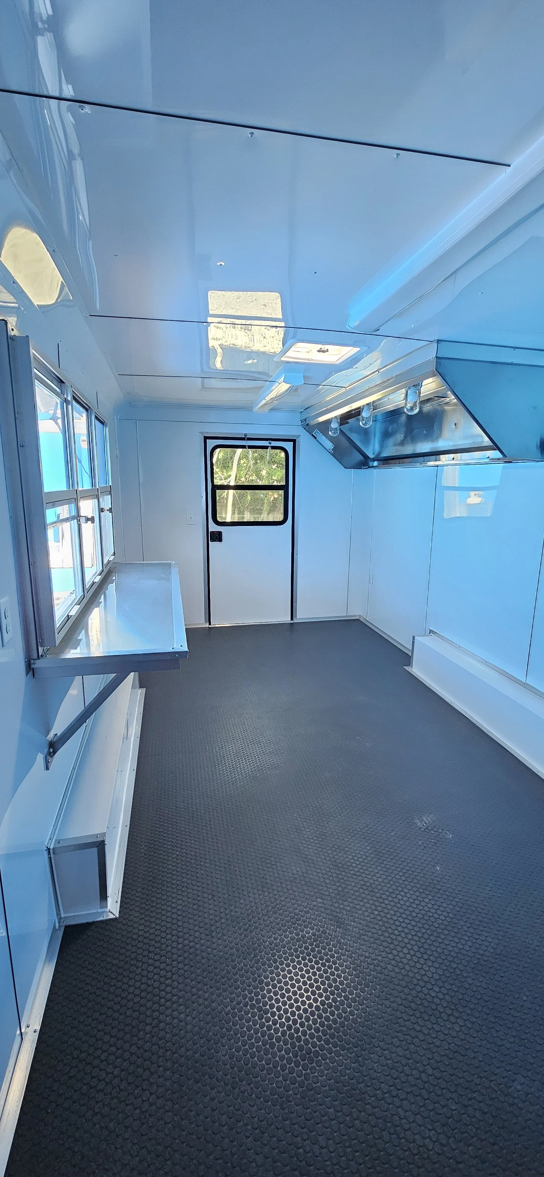 side towards back door with white interior of 8.5X20TA3 Red Concession Trailer #70144