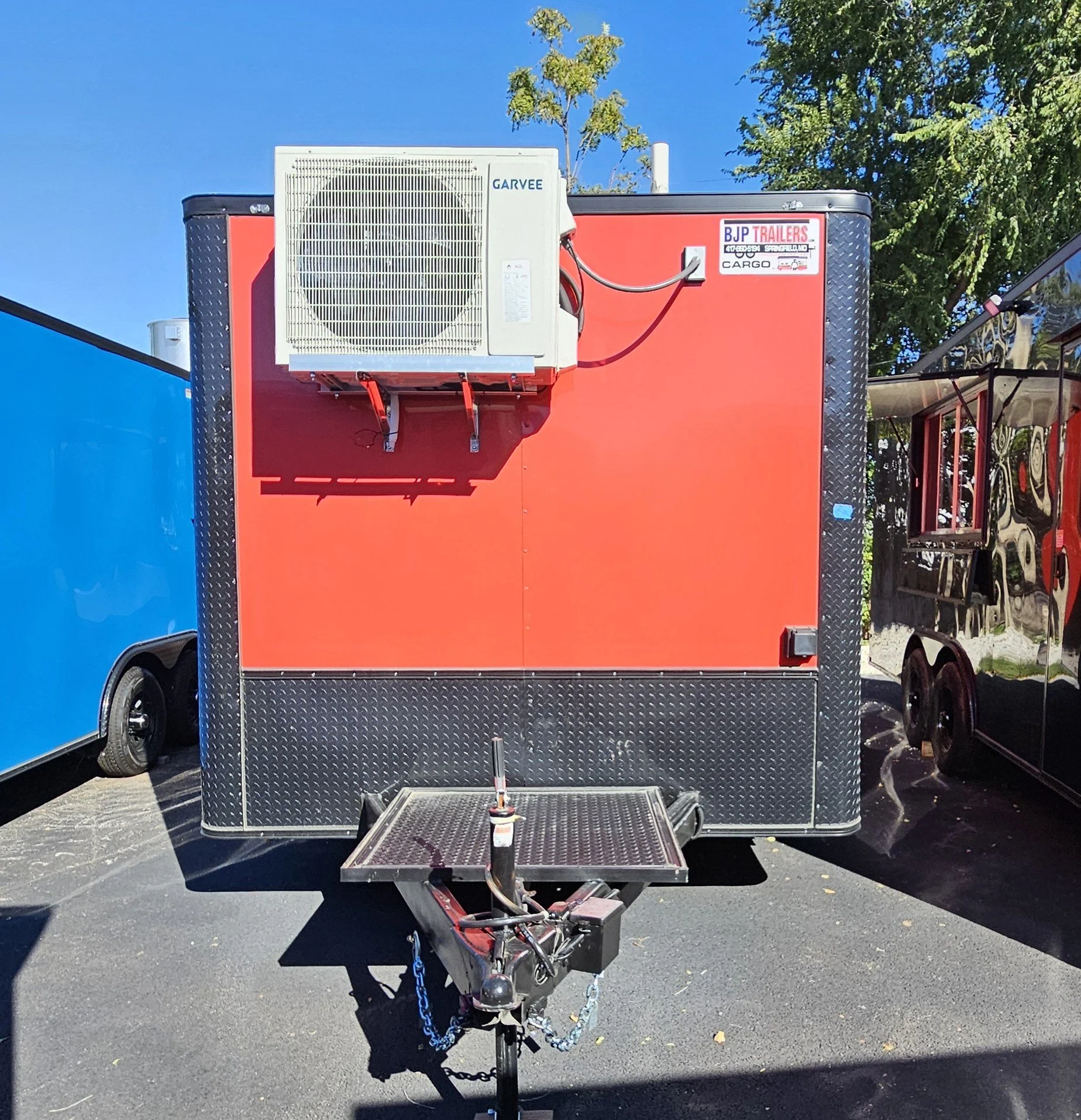 nose of 8.5X20TA3 Red Concession Trailer #70144 showing air conditioner