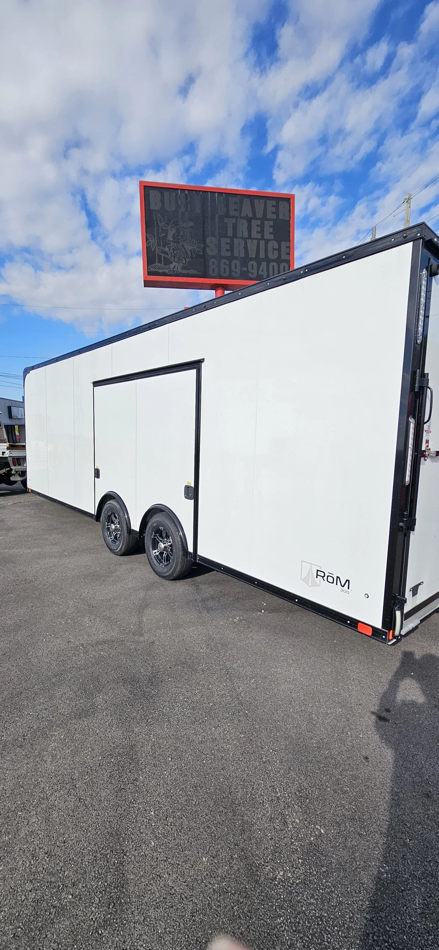 Escape door view of 8.5X 30 White Car Hauler #32088