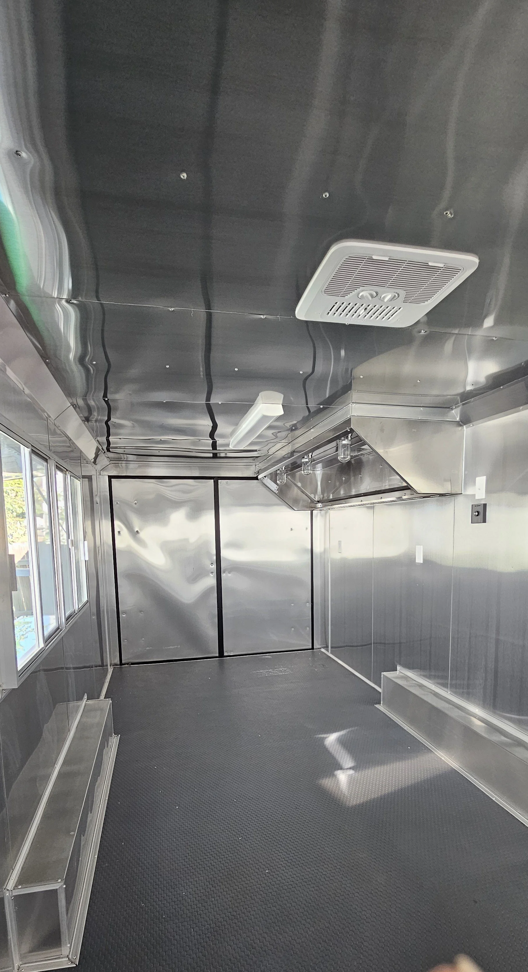 stainless steel interior of 8.5X24 Green Concession Trailer #70672