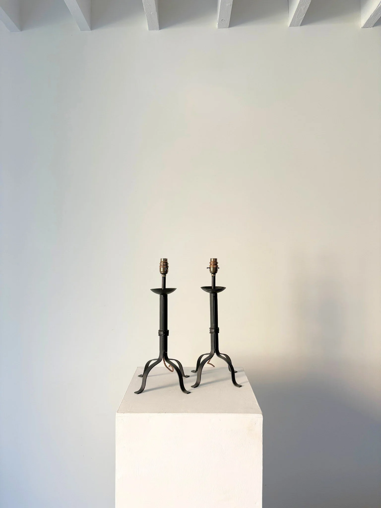 Pair of Steel Candlestick Lamps Overpainted In Black - Bureau Bruton