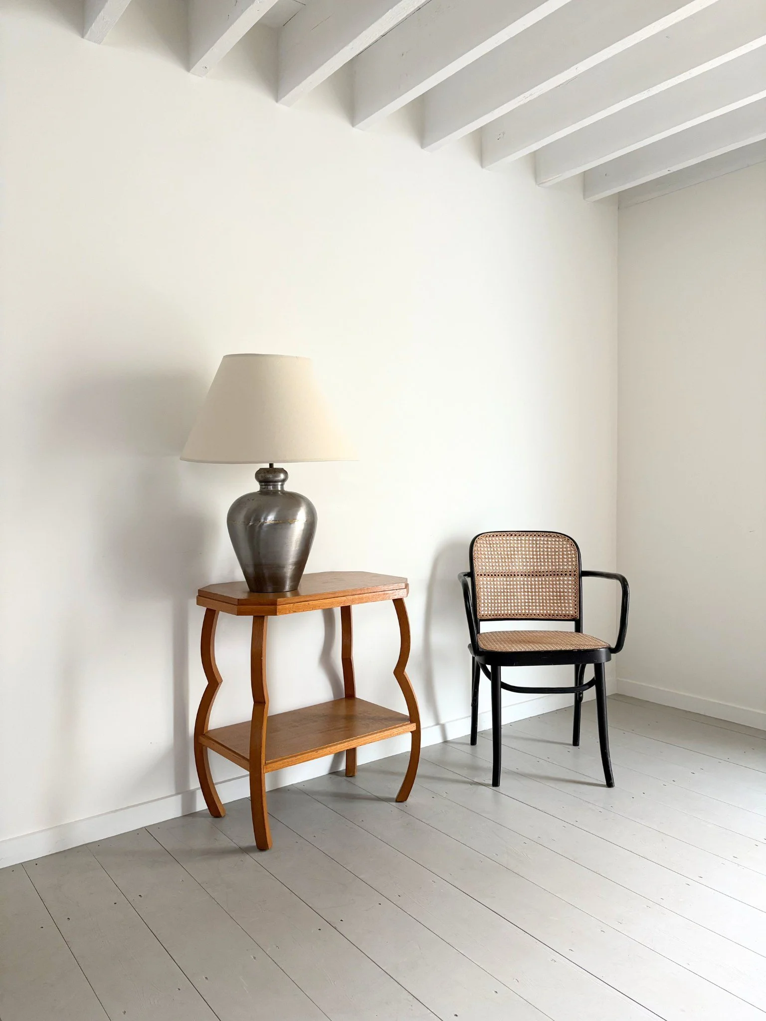 Our large Mixed Metal Lamp sits atop an Art Deco Pinched Leg Side Table - Bureau Bruton