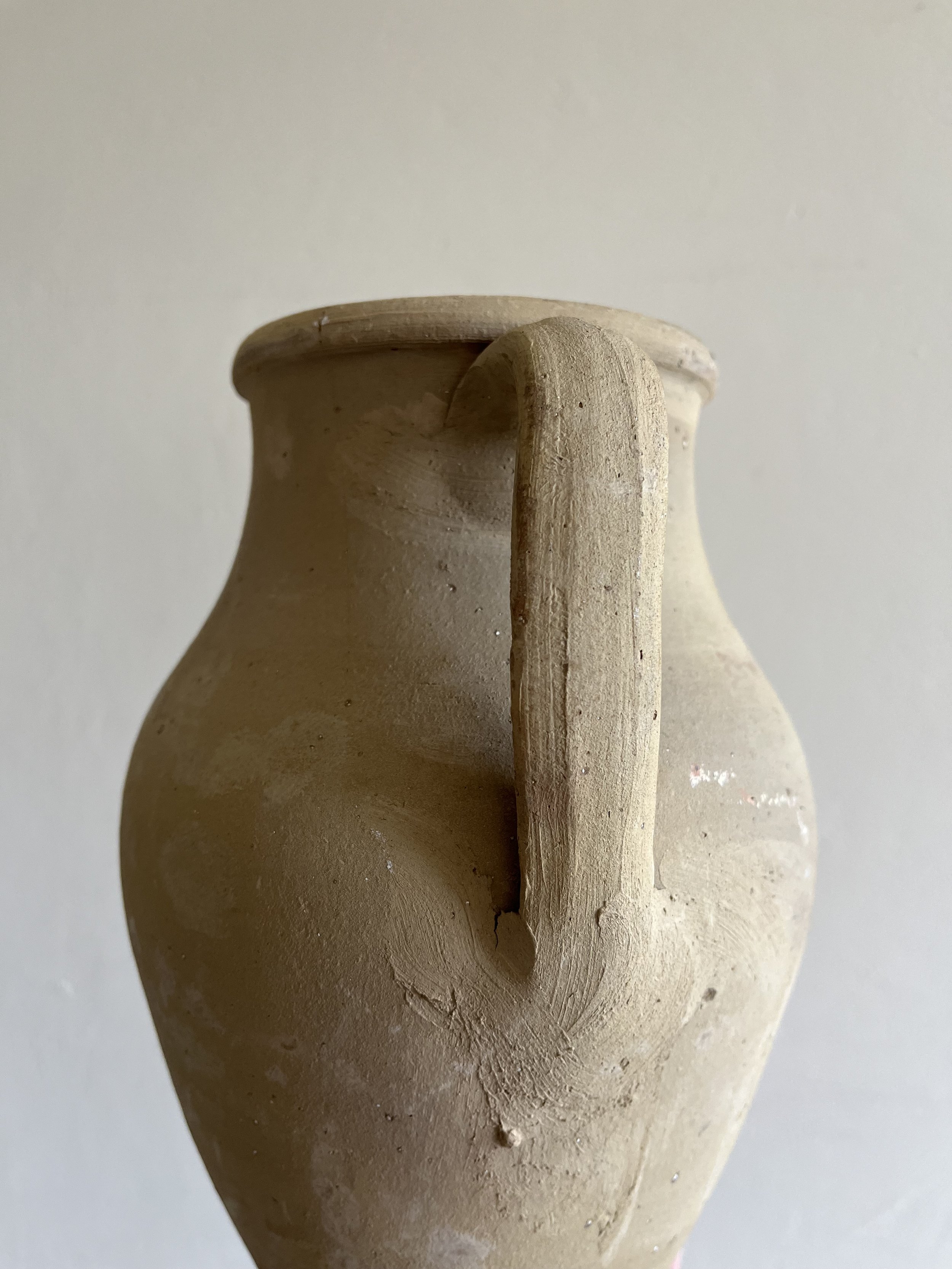 Single handled terracotta pot vase