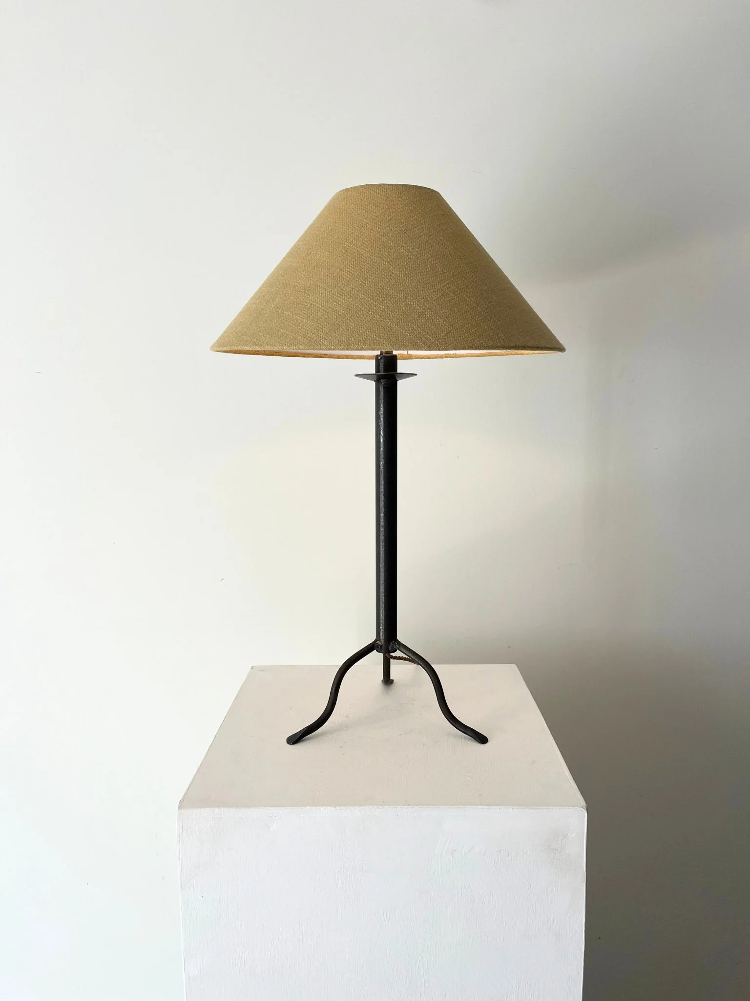 Rustic yet elegant hand wrought metal table lamp with tripod base, rewired and available at Bureau Bruton