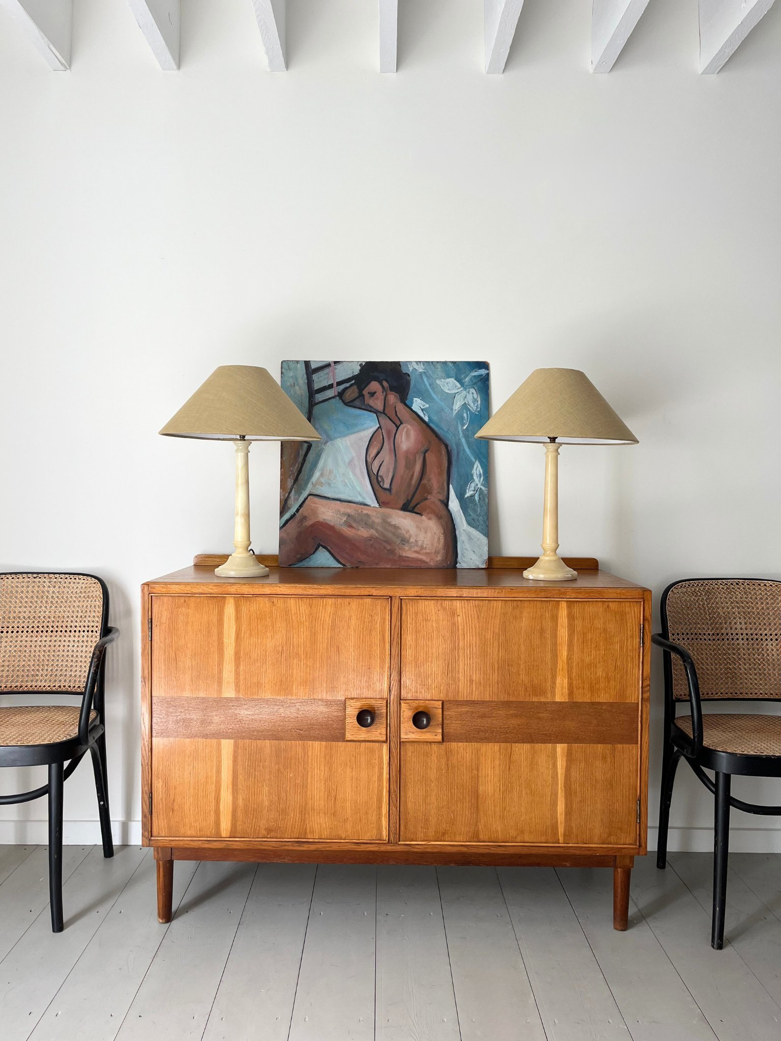 Stylised Nude Oil Painting, styled here with a Mid Century Inlaid Sideboard and a Pair of Spanish Alabaster Lamps - Bureau Bruton