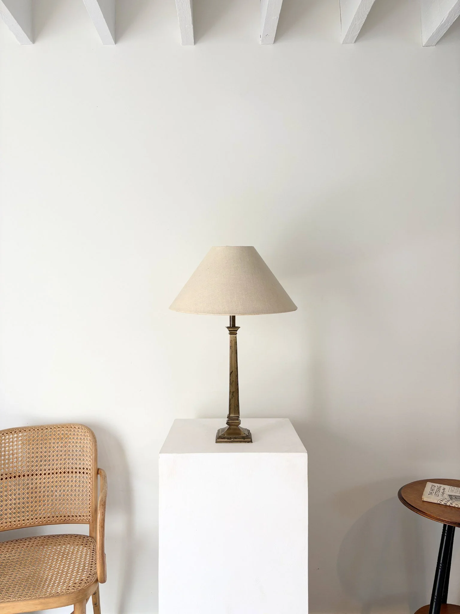 Patinated Brass Column Lamp, photographed here with a vintage 811 Thonet Prague chair - Bureau Bruton Antiques and Vintage
