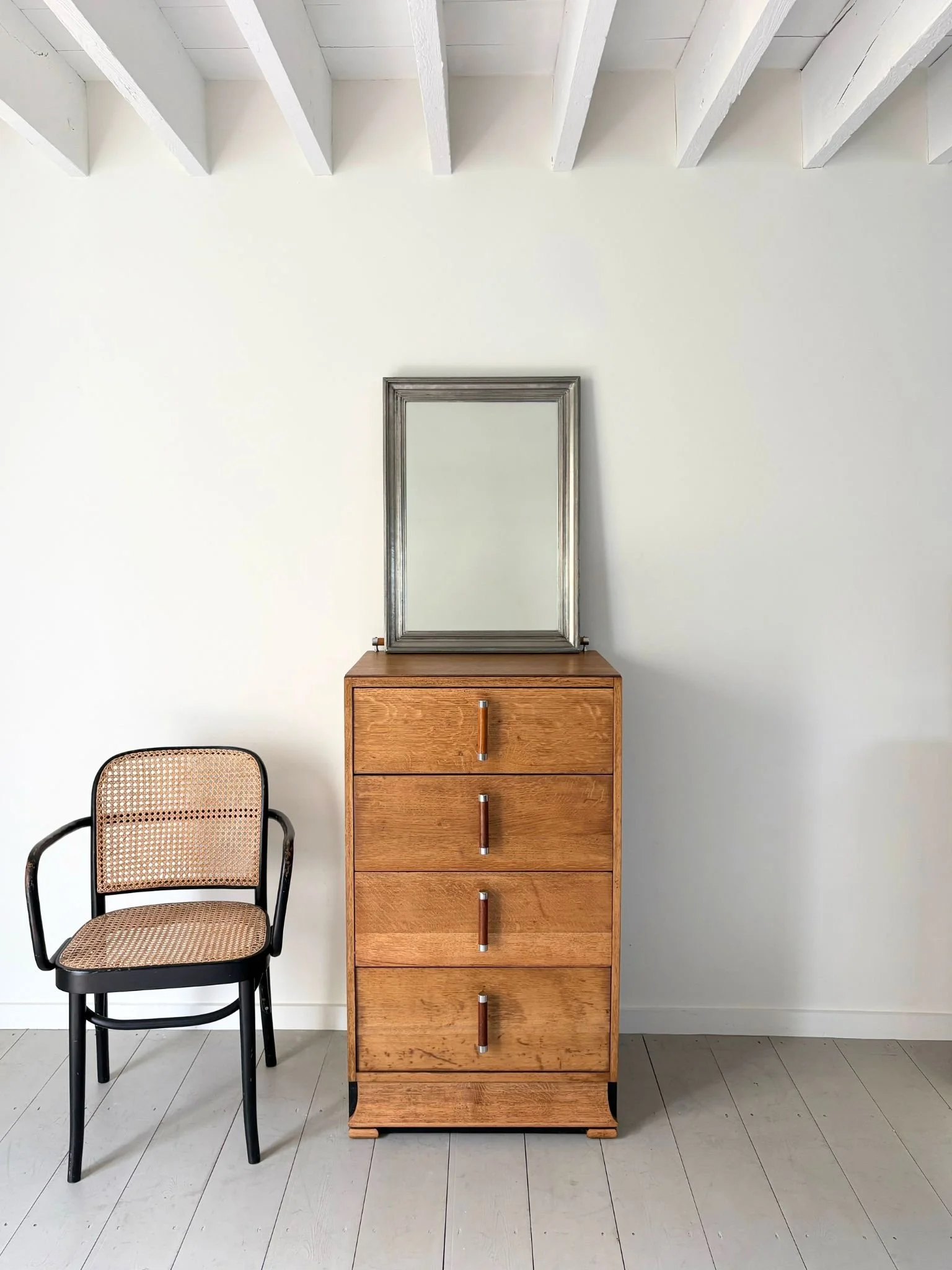 Silvered Repousse Wall Mirror, sits atop our Art Deco Drawers - Bureau Bruton Antique and Vintage Design Shop